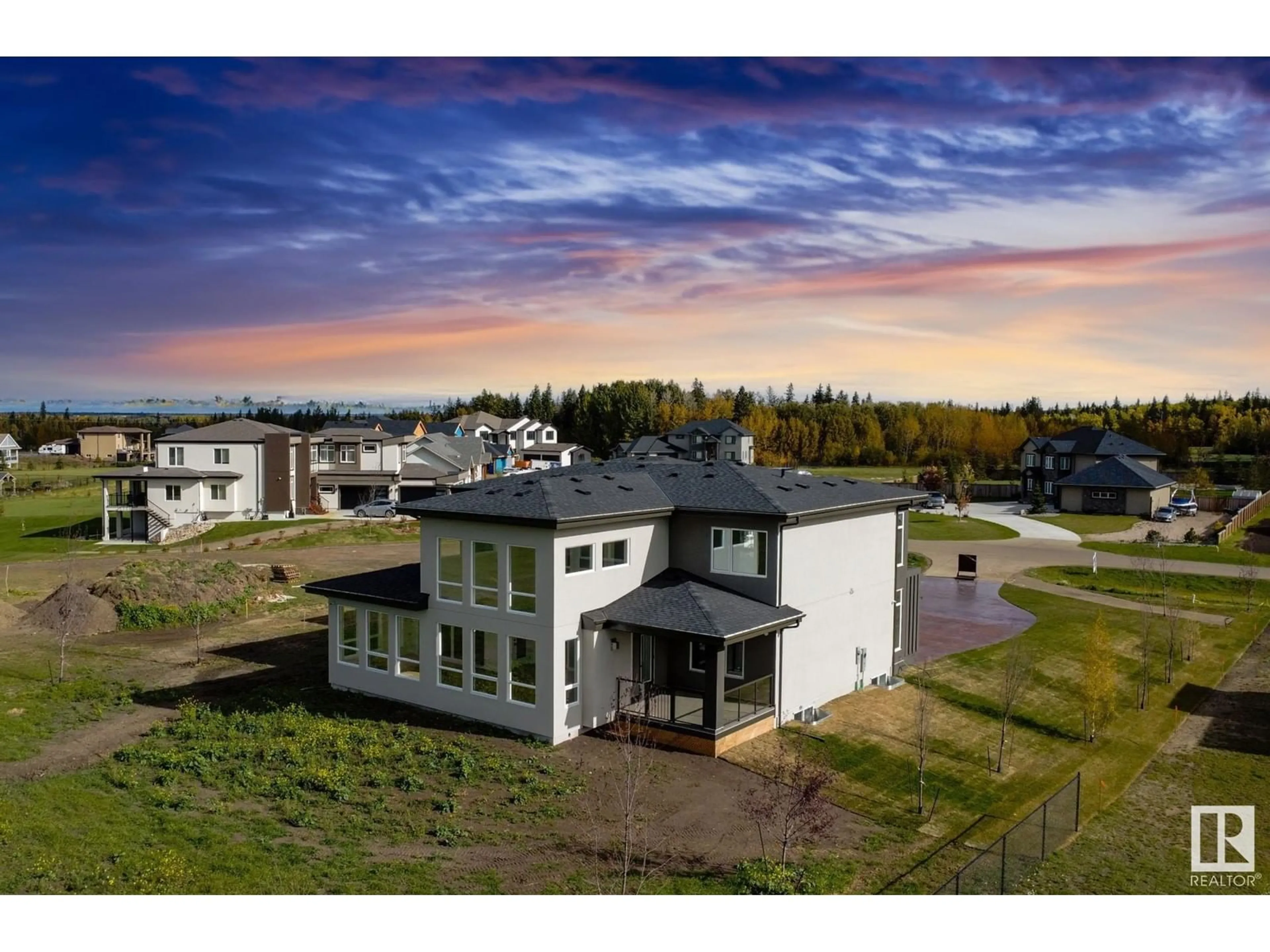 A pic from outside/outdoor area/front of a property/back of a property/a pic from drone, unknown for 53 26409 TWP RD 532 A, Rural Parkland County Alberta T7X0W7