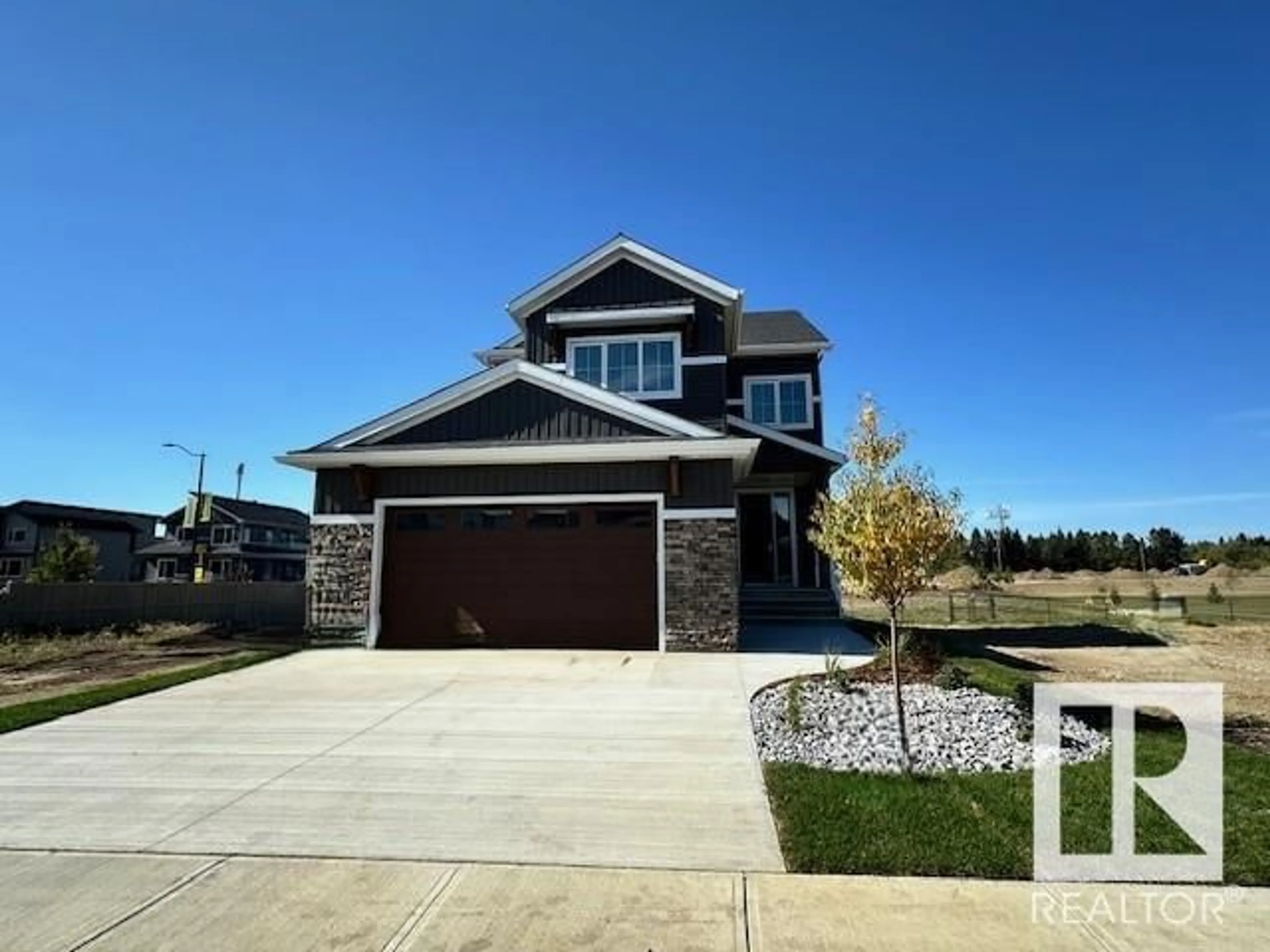 Frontside or backside of a home, the street view for 102 Lilac CL, Leduc Alberta T9E1R3