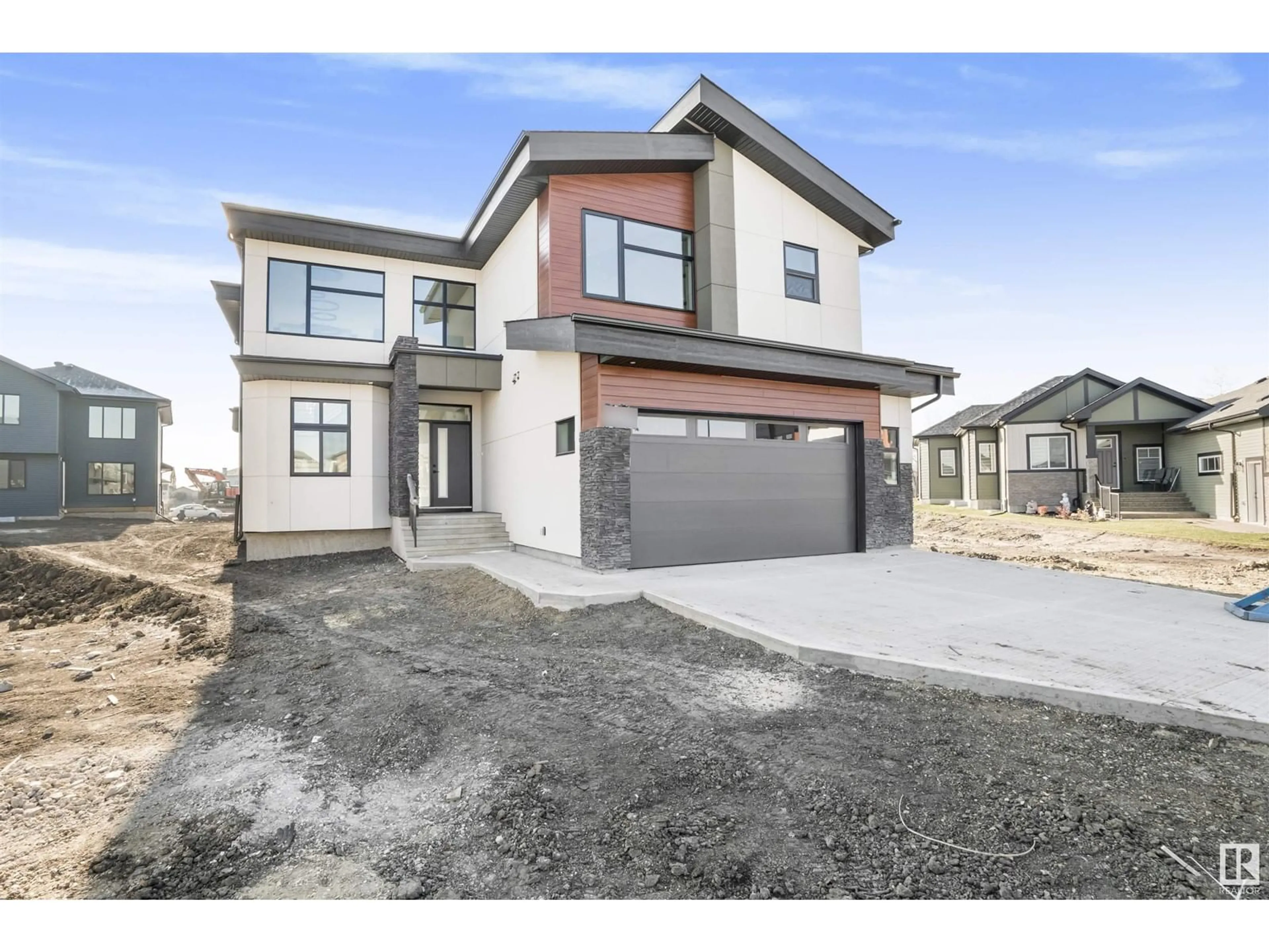 Frontside or backside of a home, the street view for 235 166 AV NE, Edmonton Alberta T5Y4J2