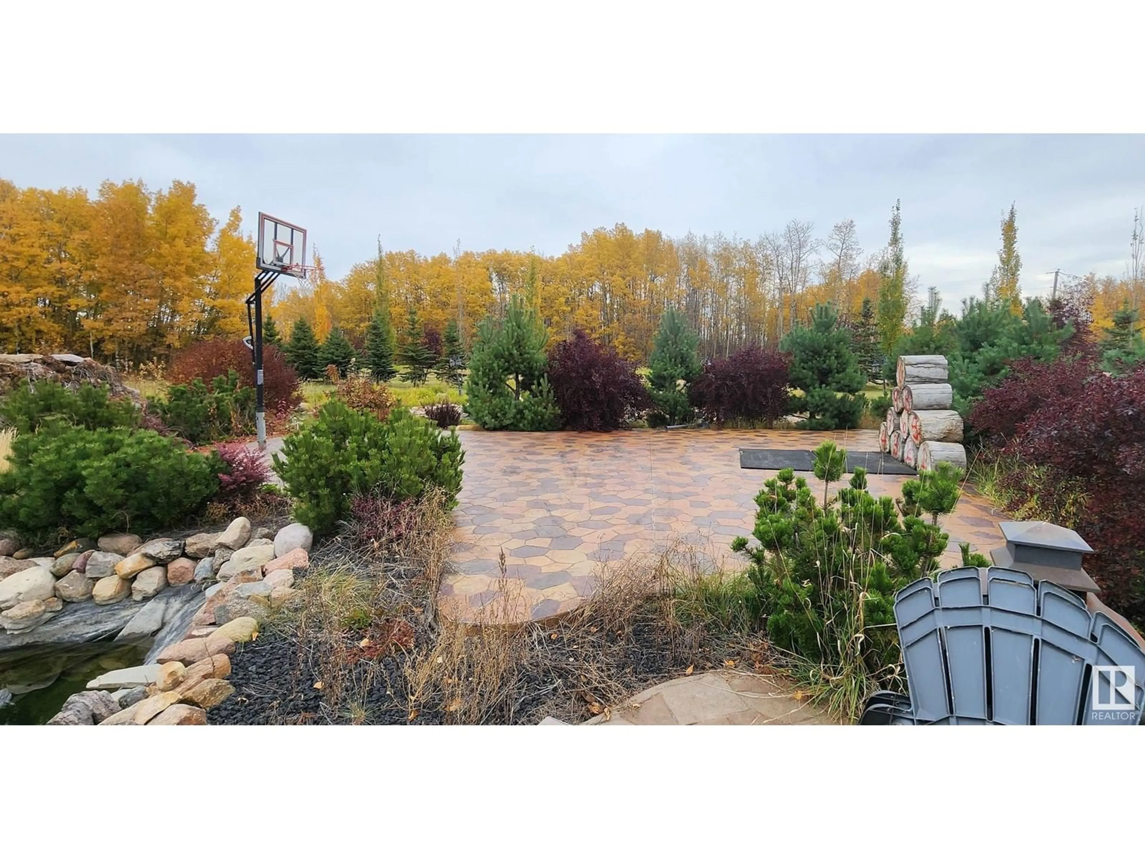 Patio, the fenced backyard for 10 27070 Twp Rd 480, Rural Leduc County Alberta T0C2P0