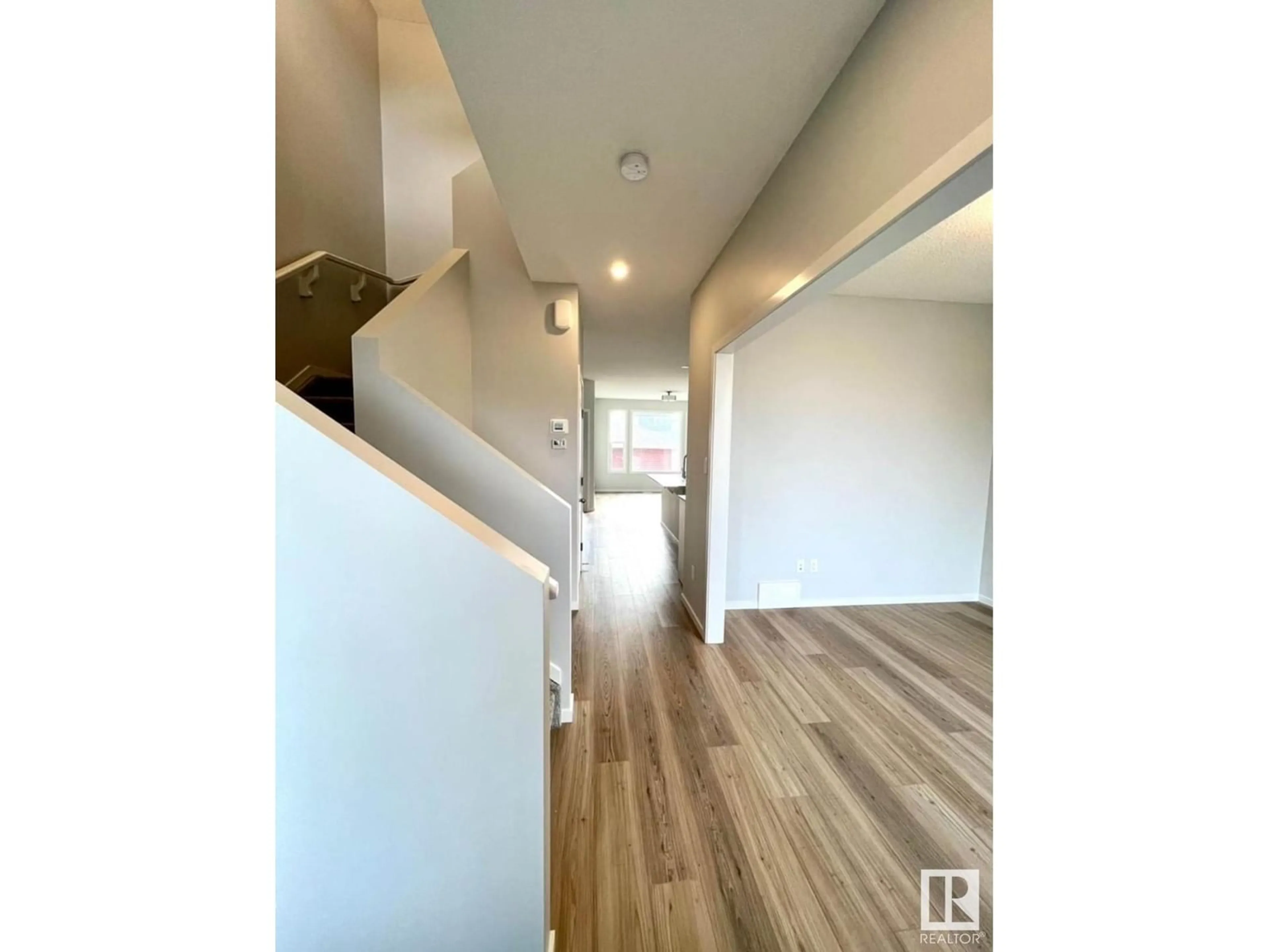 Indoor entryway, wood floors for 5235 22 AV SW SW, Edmonton Alberta T6X2Y1