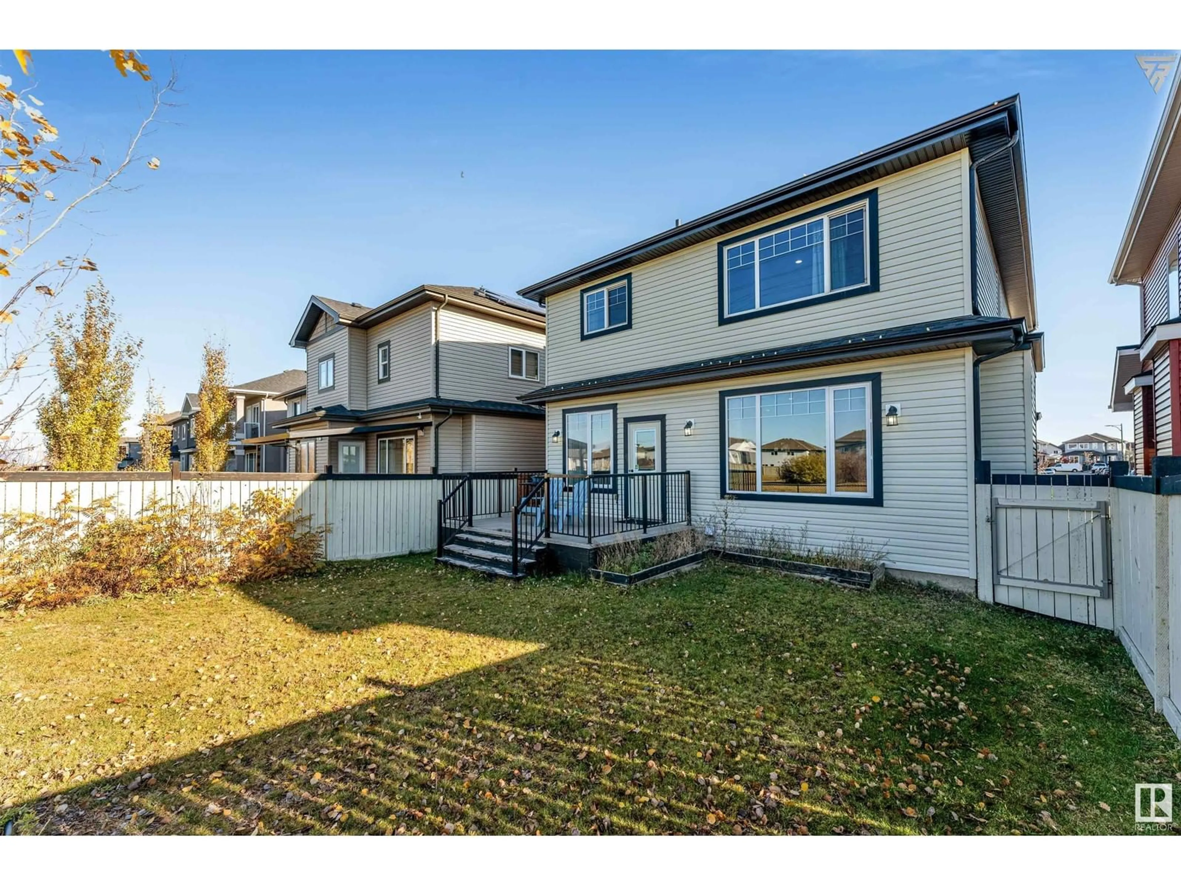 Frontside or backside of a home, the fenced backyard for 2104 27 ST NW NW, Edmonton Alberta T6T0Y6