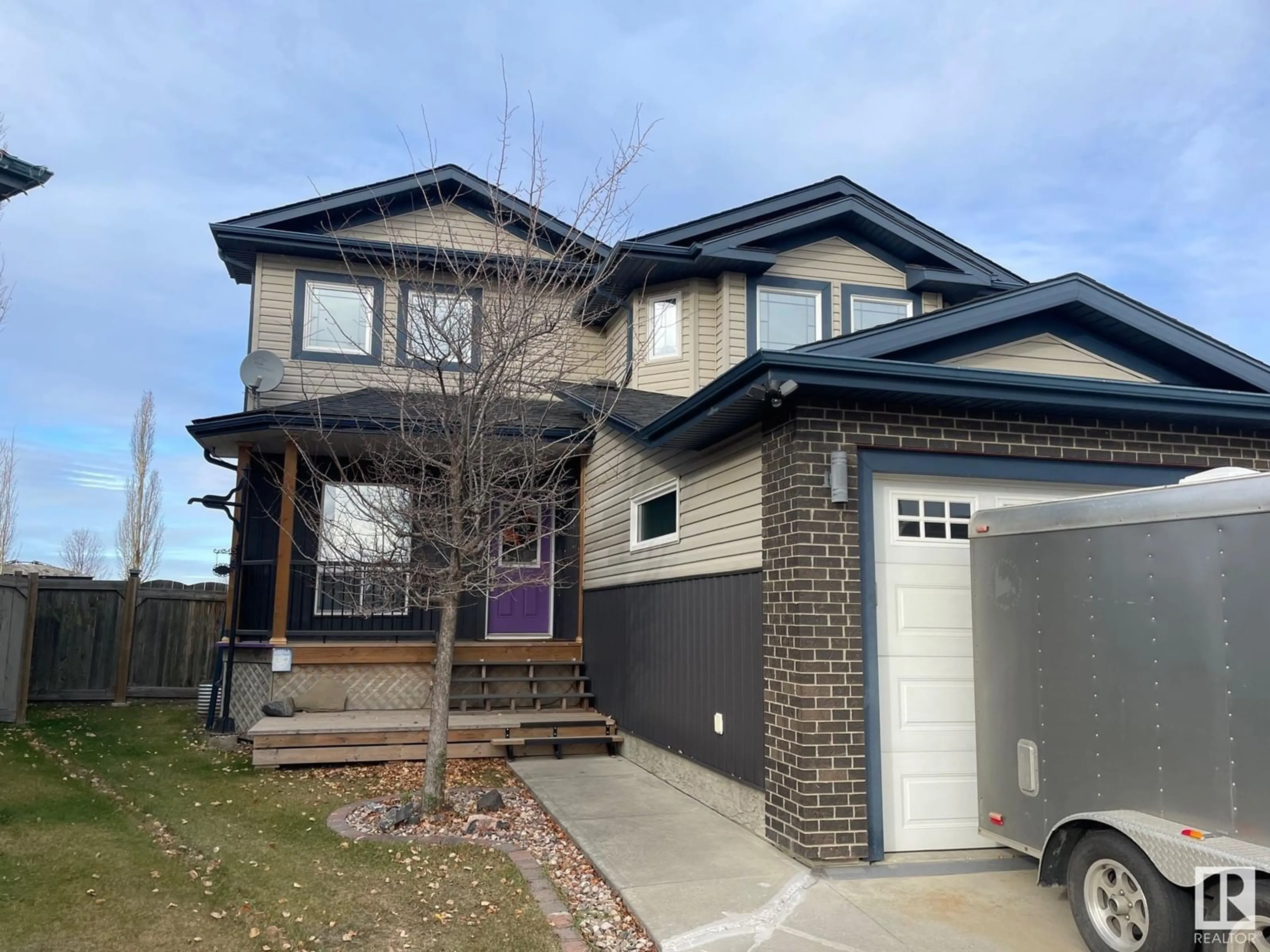 Frontside or backside of a home, the street view for 9614 82 AV, Morinville Alberta T8R1W3