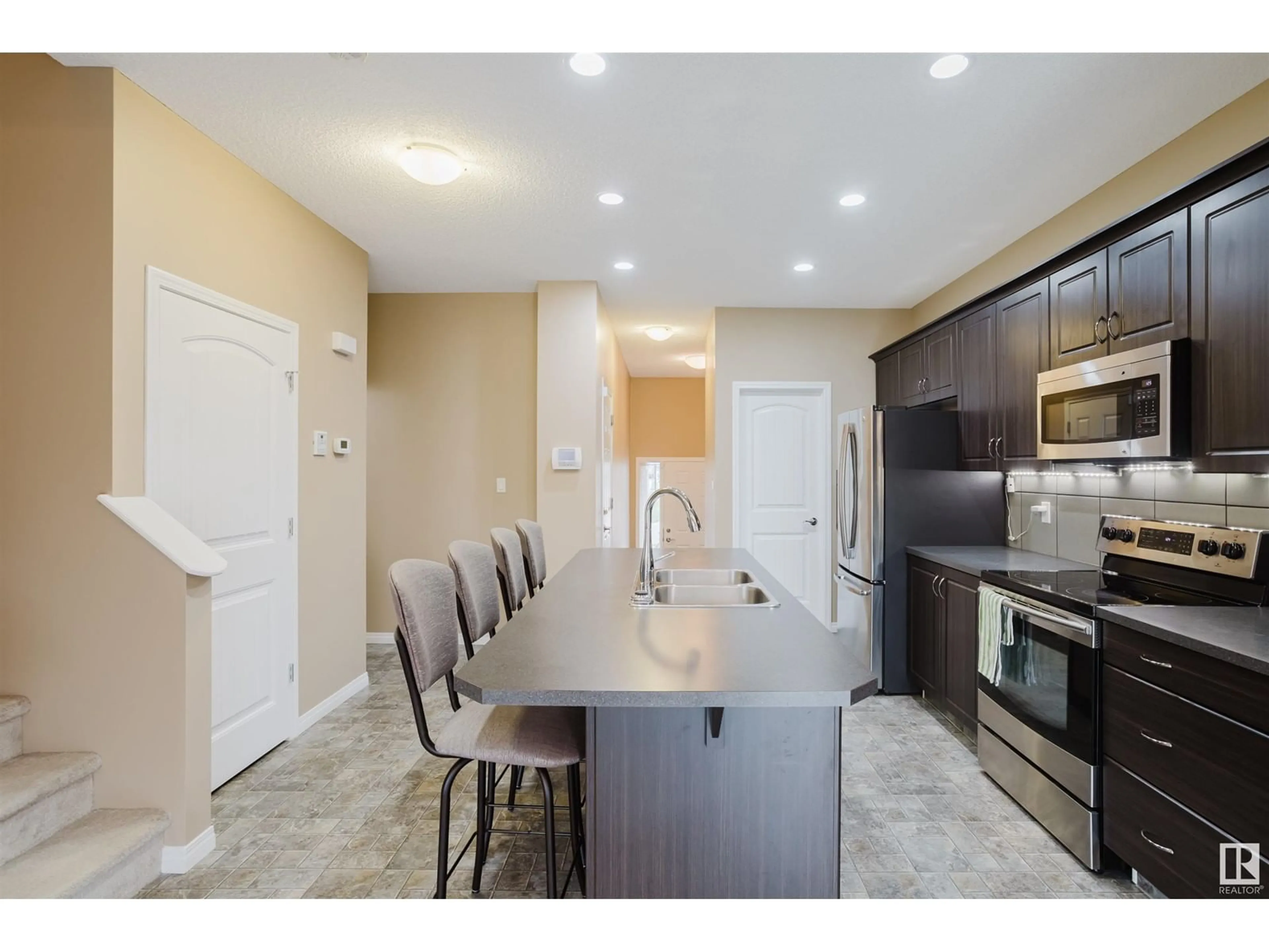 Open concept kitchen for 381 SIMMONDS WY, Leduc Alberta T9E0T9