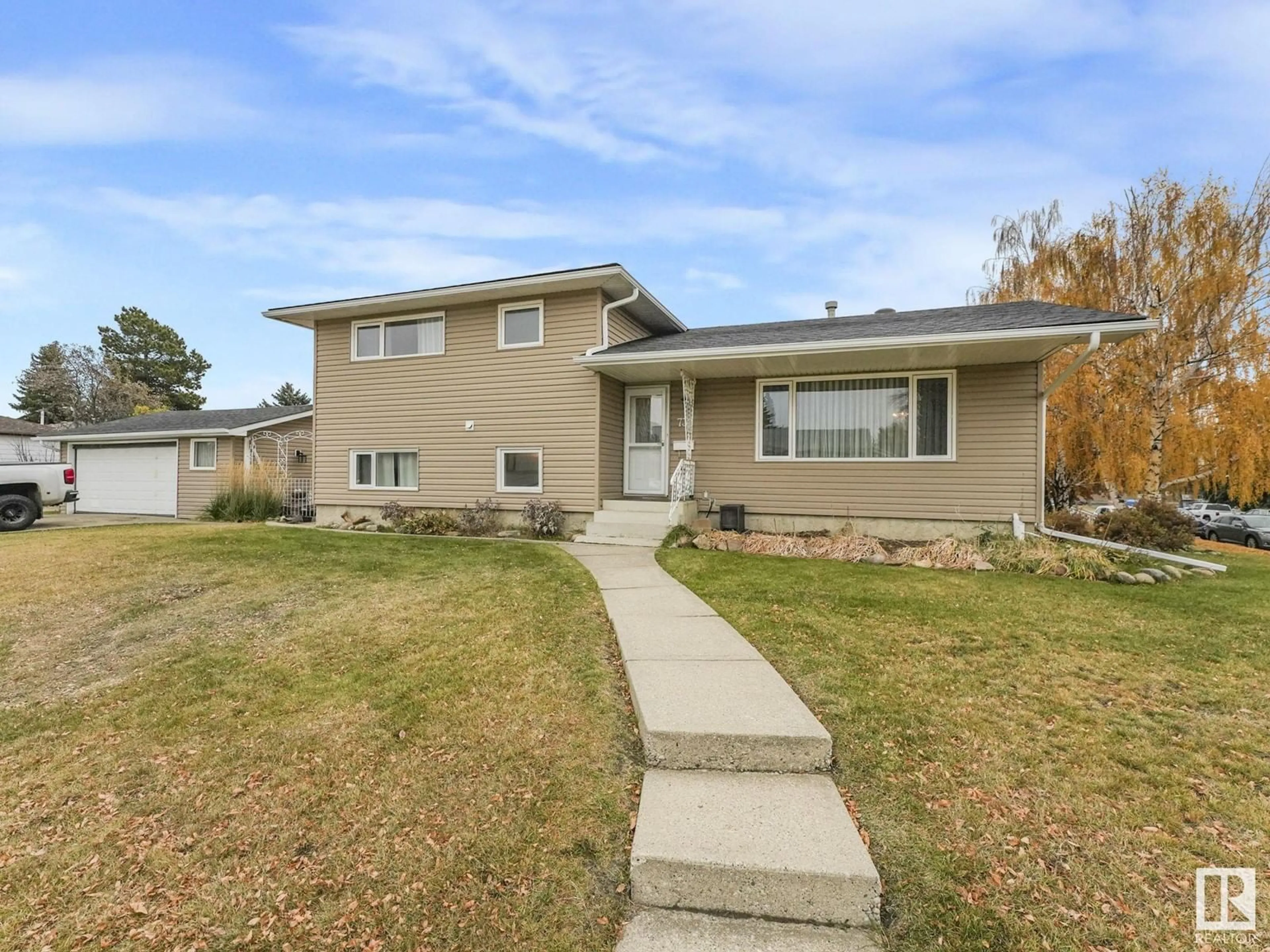 Frontside or backside of a home, the street view for 7311 143 AV NW NW, Edmonton Alberta T5C2P9