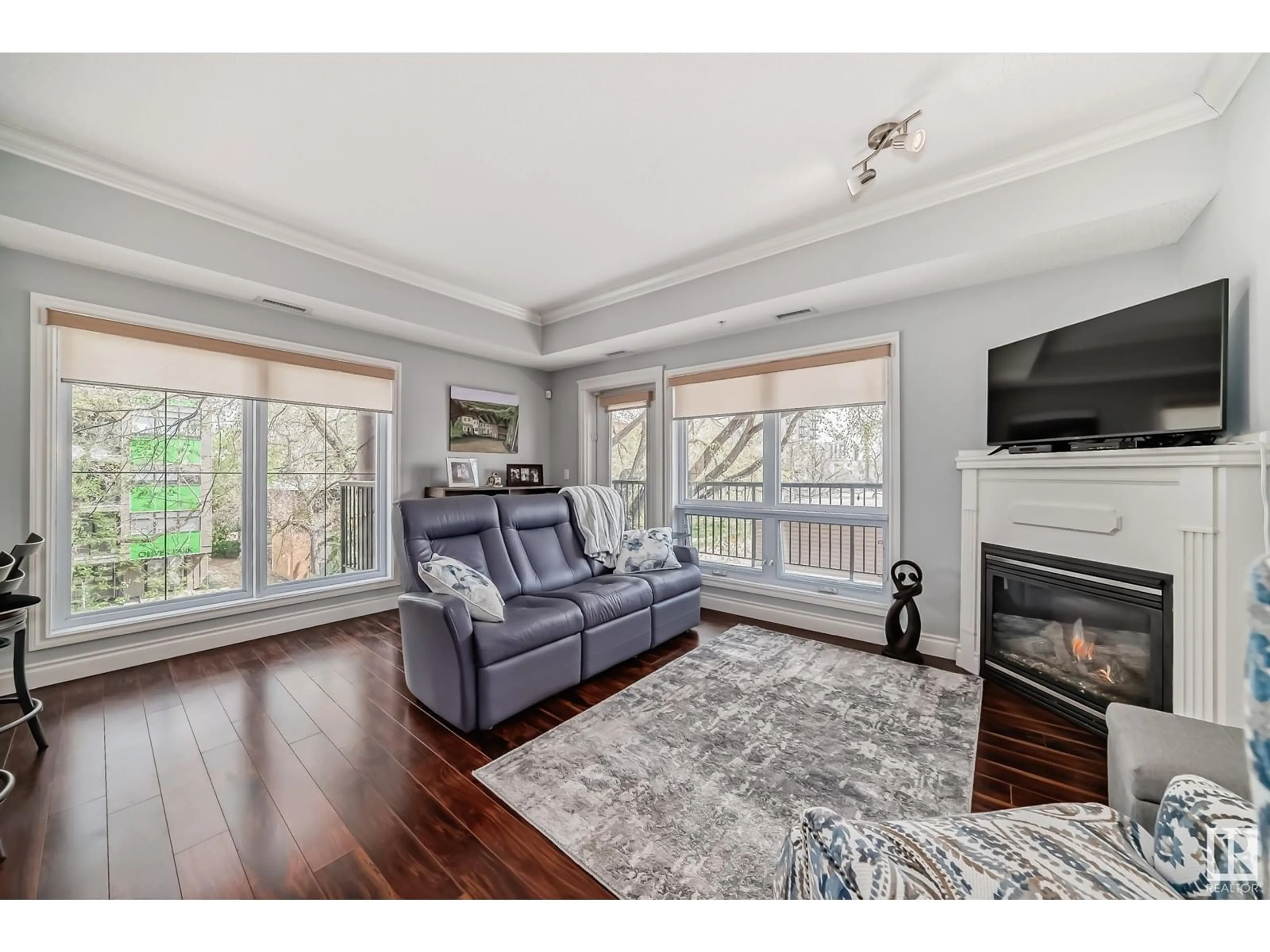 Living room, wood floors for #302 10232 115 ST NW, Edmonton Alberta T5K1T7