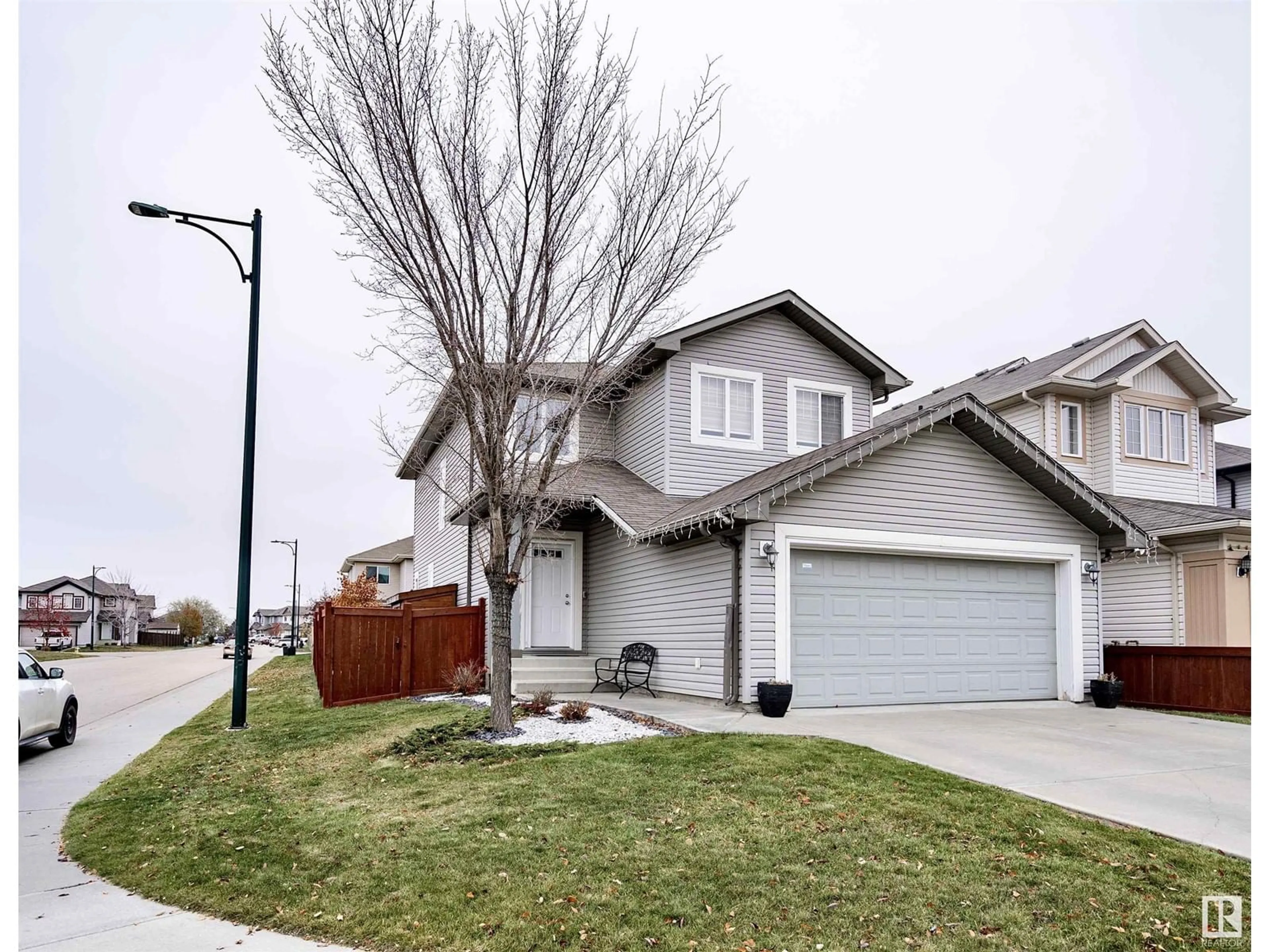 Frontside or backside of a home, the street view for 1405 114B ST SW, Edmonton Alberta T6W0N2