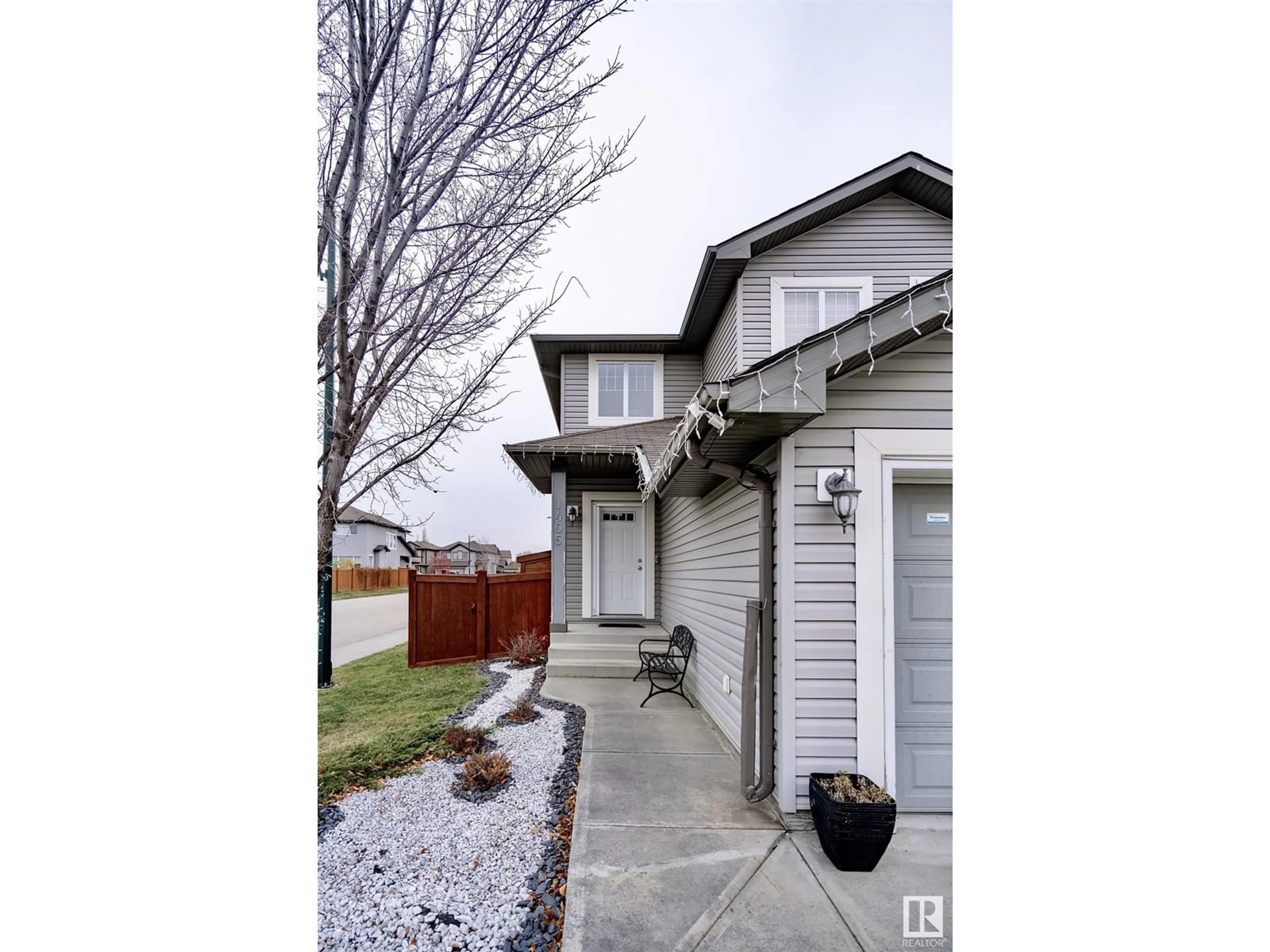 Frontside or backside of a home, the street view for 1405 114B ST SW, Edmonton Alberta T6W0N2