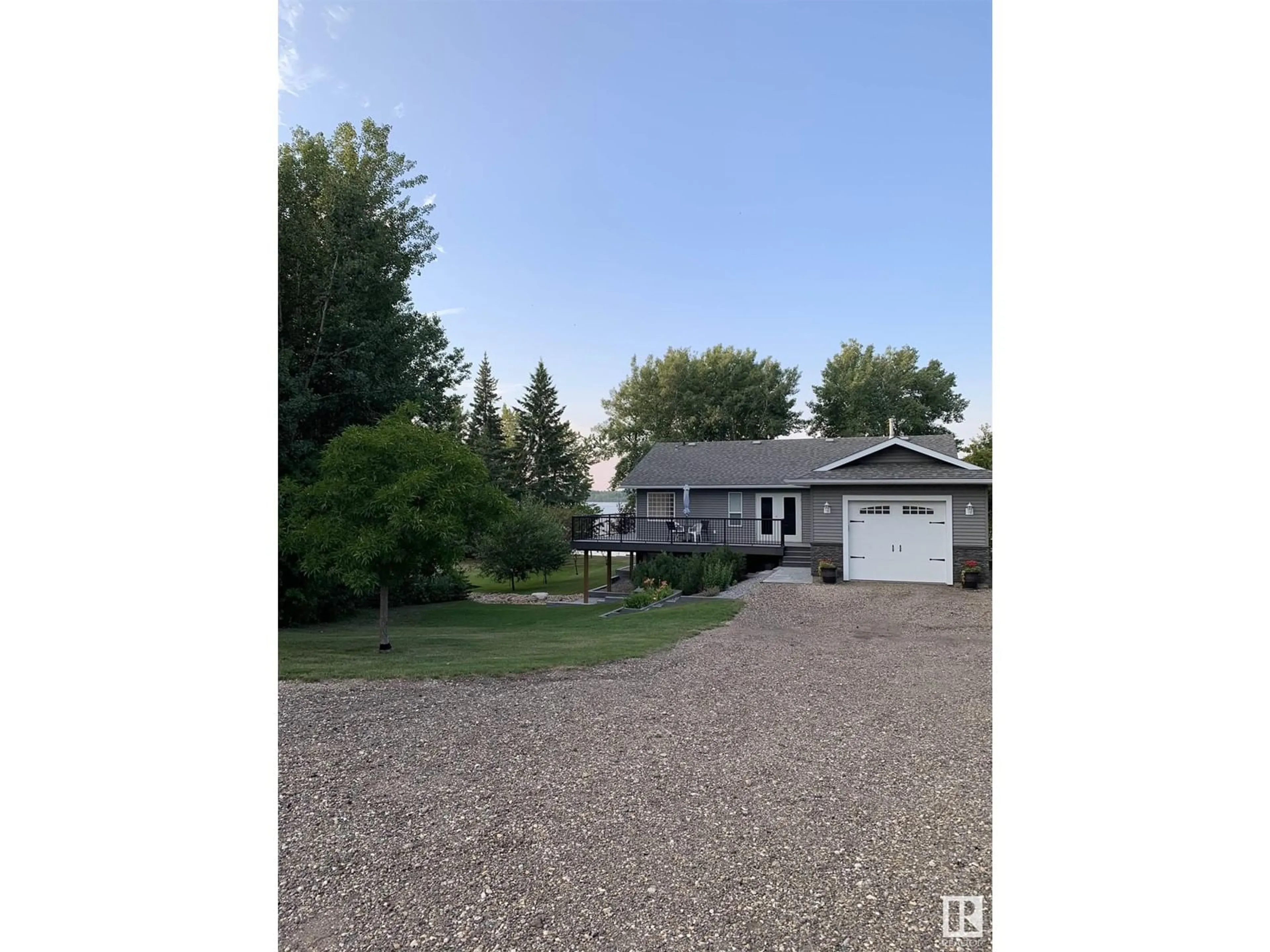 Frontside or backside of a home, the street view for 5551B Nakamun Drive, Rural Lac Ste. Anne County Alberta T0E1A0