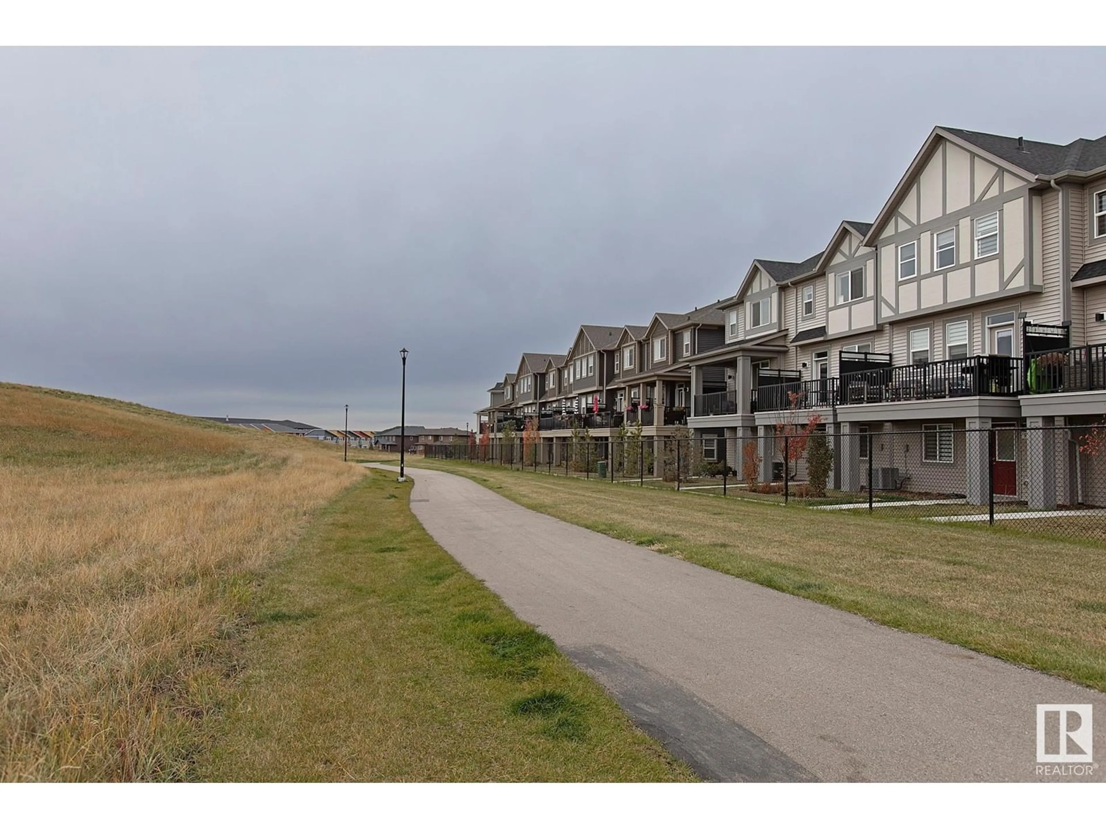 A pic from exterior of the house or condo, the street view for #57 2072 WONNACOTT WY SW, Edmonton Alberta T6X2V7