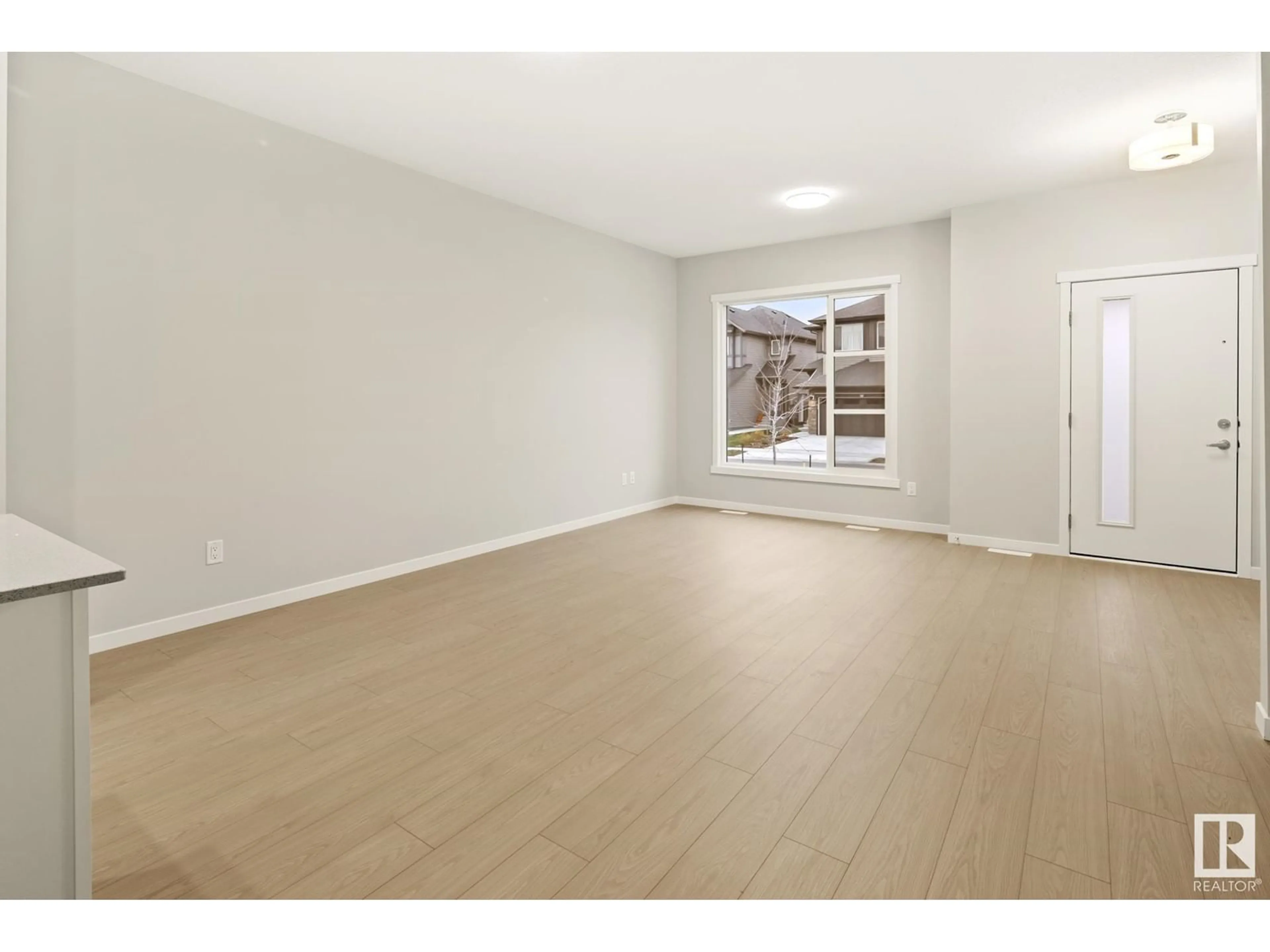 A pic of a room, wood floors for 25 DORAIS WAY, Fort Saskatchewan Alberta T8L0Y8