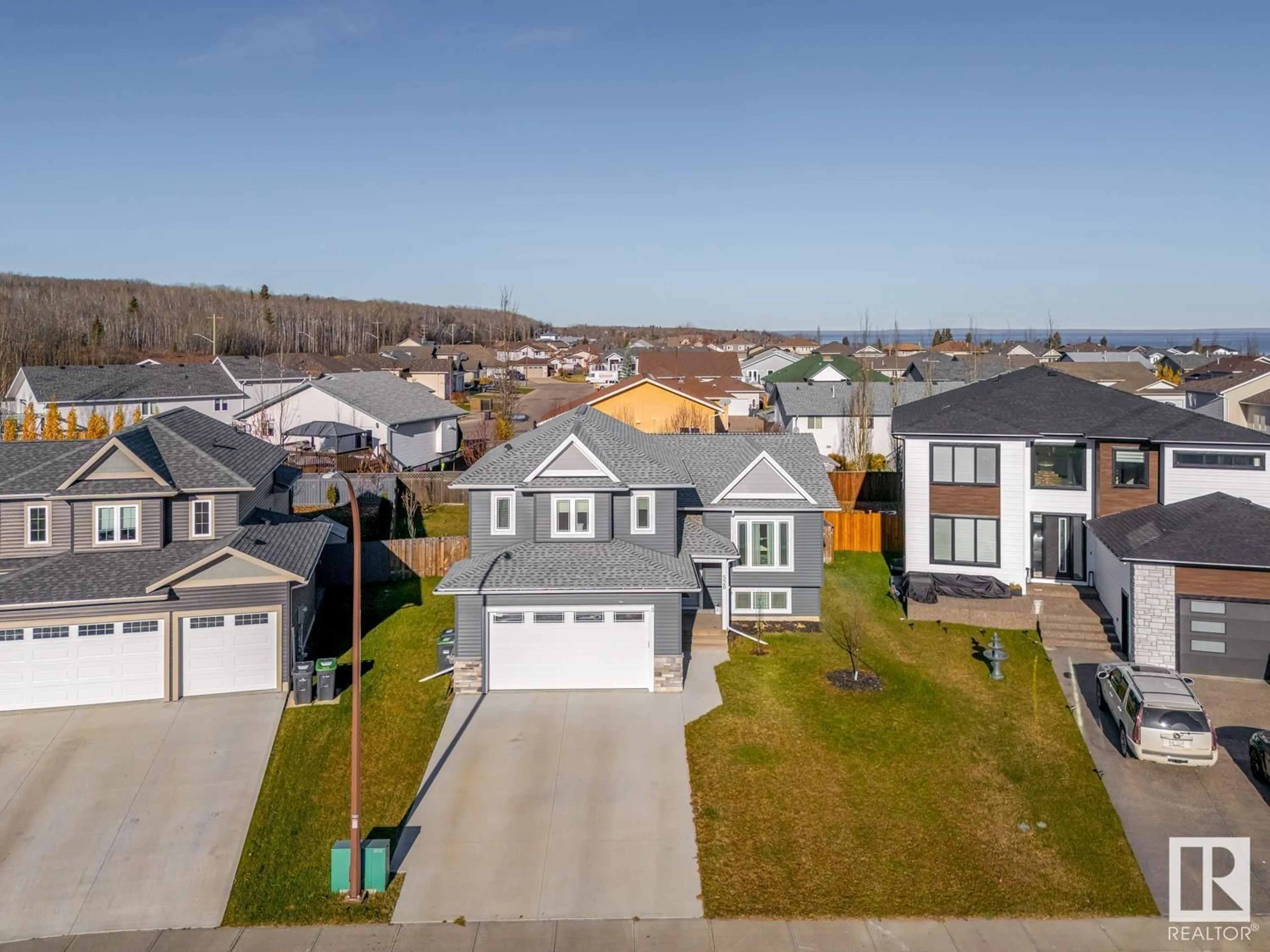 A pic from outside/outdoor area/front of a property/back of a property/a pic from drone, street for 520 LAKEWOOD CL, Cold Lake Alberta T9M0E9
