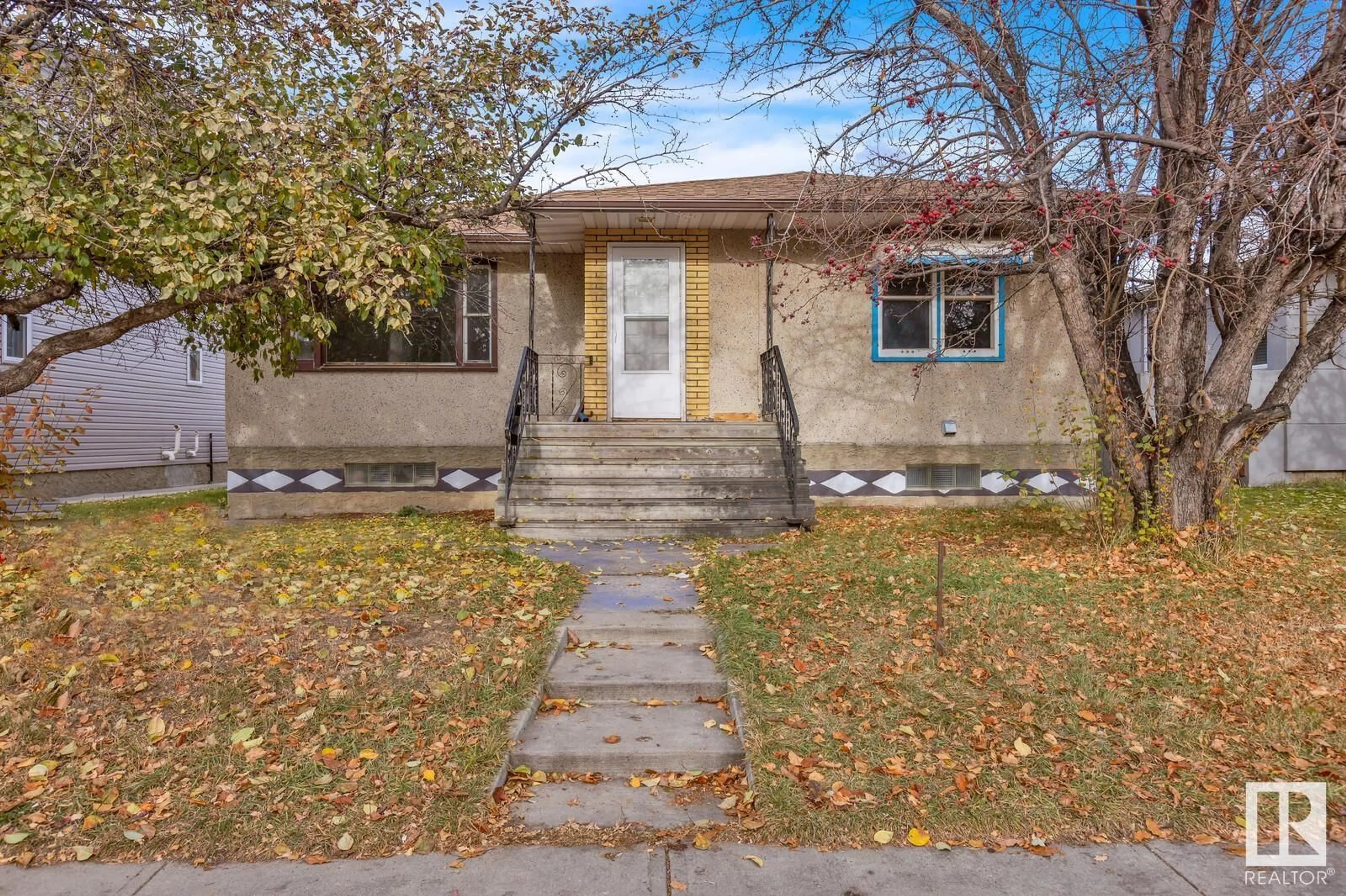 Frontside or backside of a home, the street view for 7936 82 AV NW, Edmonton Alberta T6C0Y2