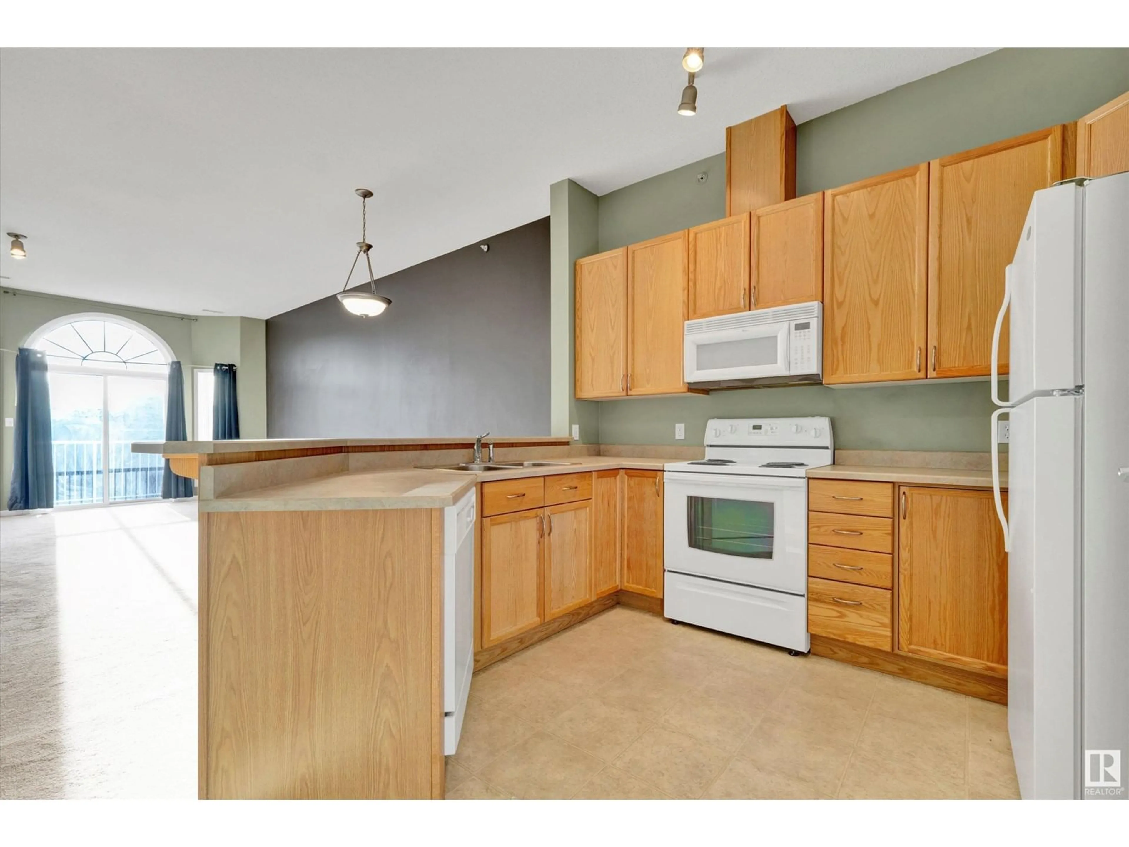 Standard kitchen, wood floors for #407 4312 139 AV NW, Edmonton Alberta T5Y3J4