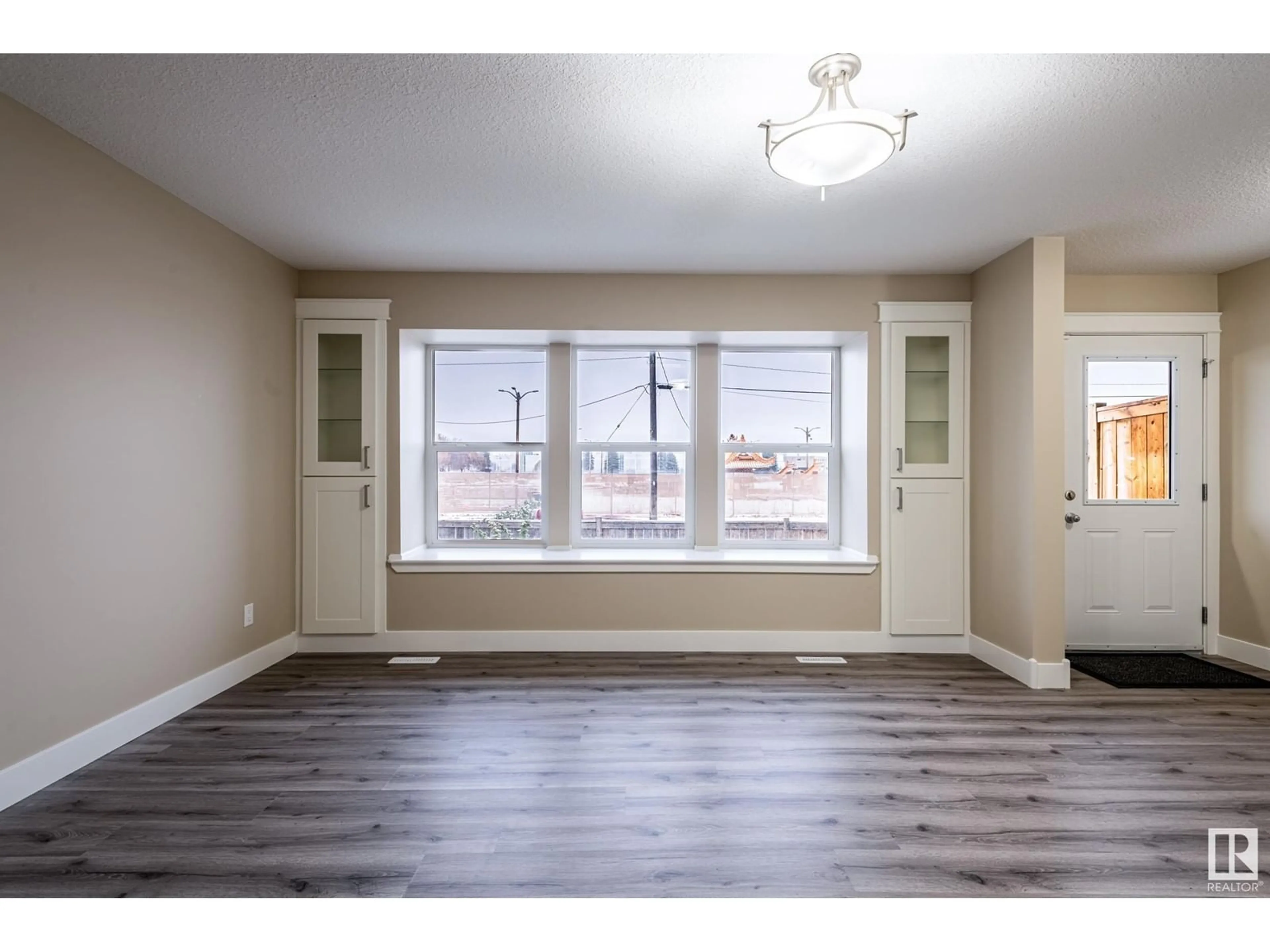 A pic of a room, wood floors for 11638 80 ST NW, Edmonton Alberta T5B2N2