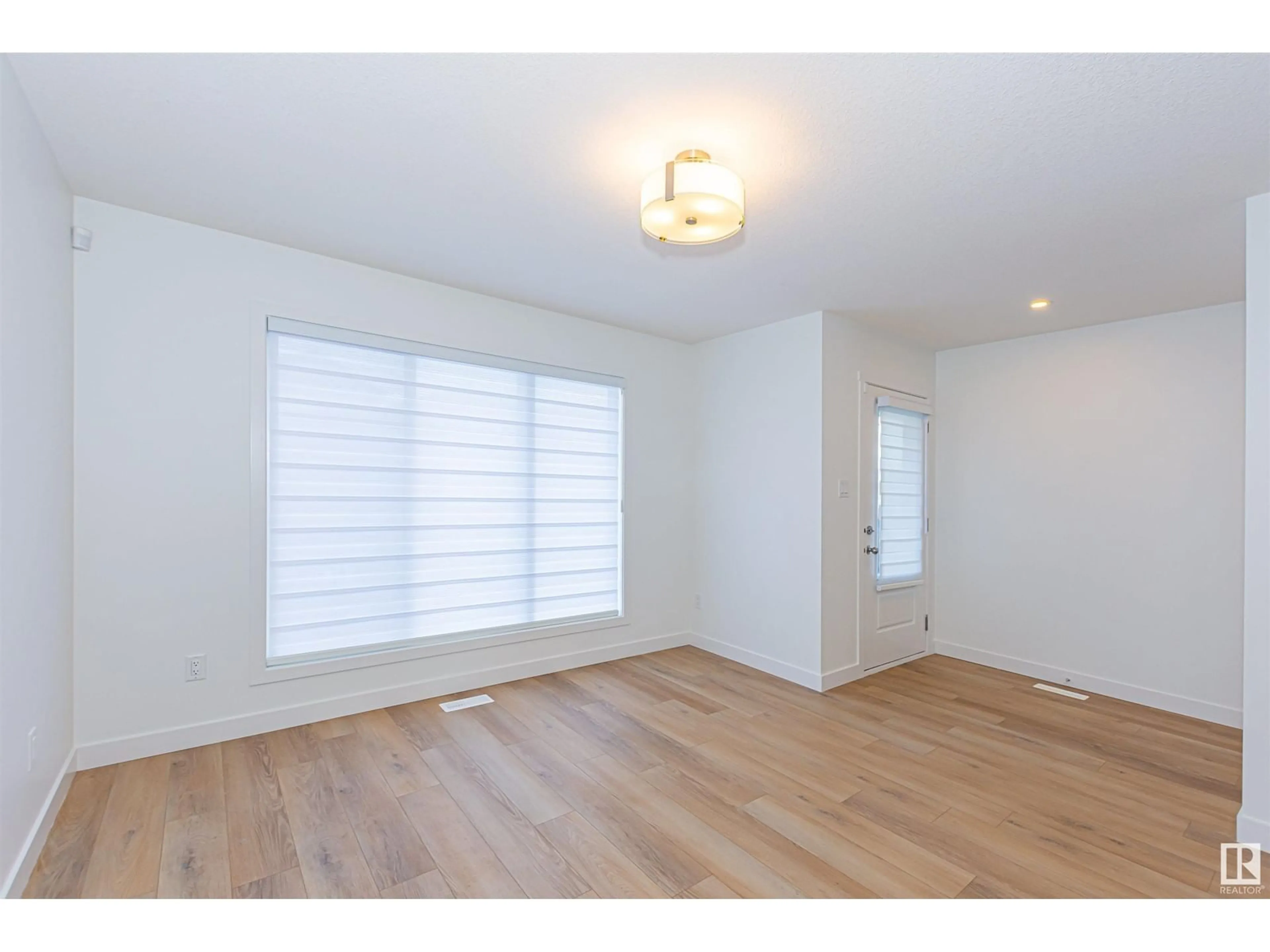 A pic of a room, wood floors for 9467 COLAK LN SW, Edmonton Alberta T6W5B6