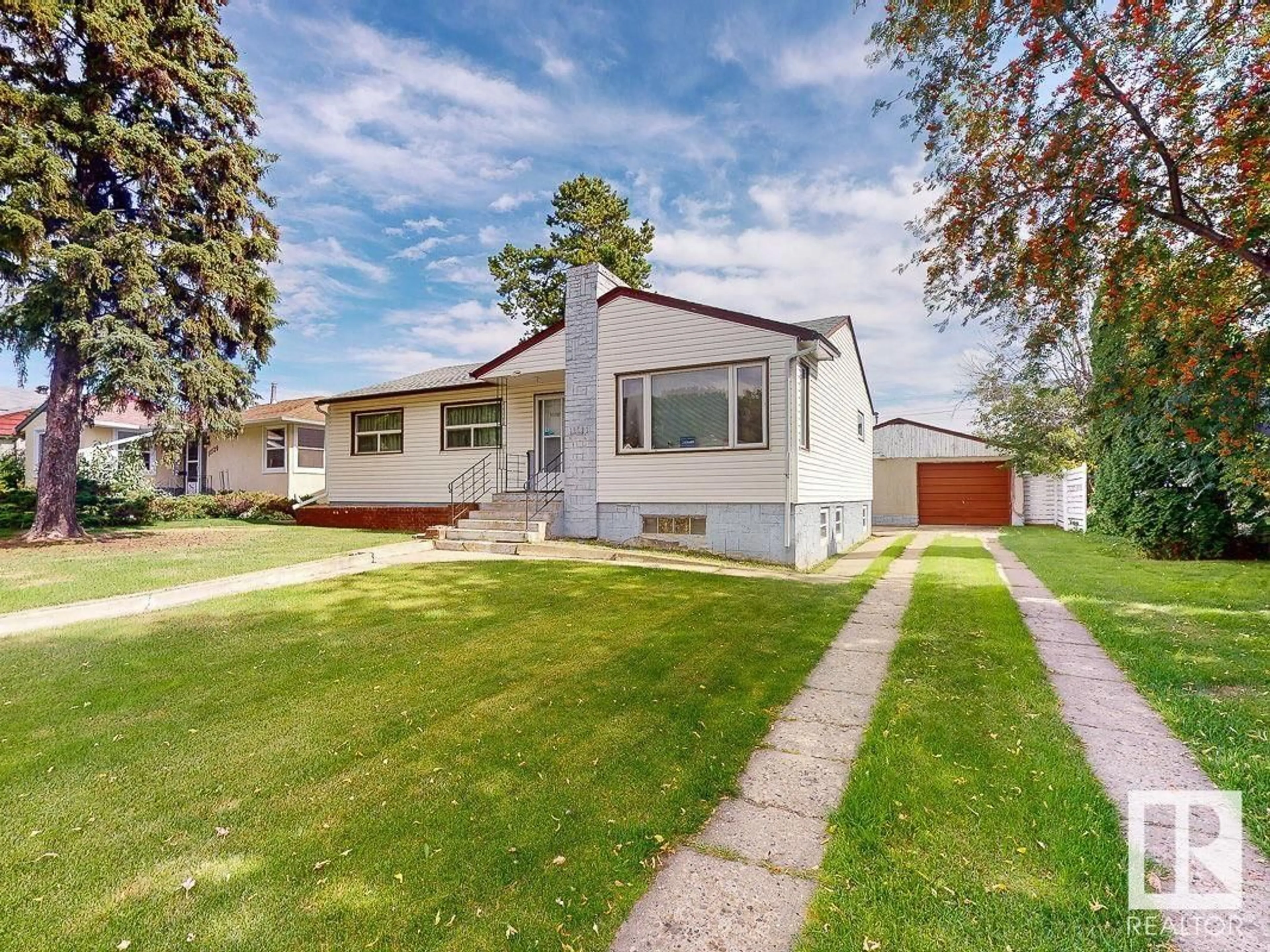 Frontside or backside of a home, cottage for 11121 51 ST NW, Edmonton Alberta T5W3E5