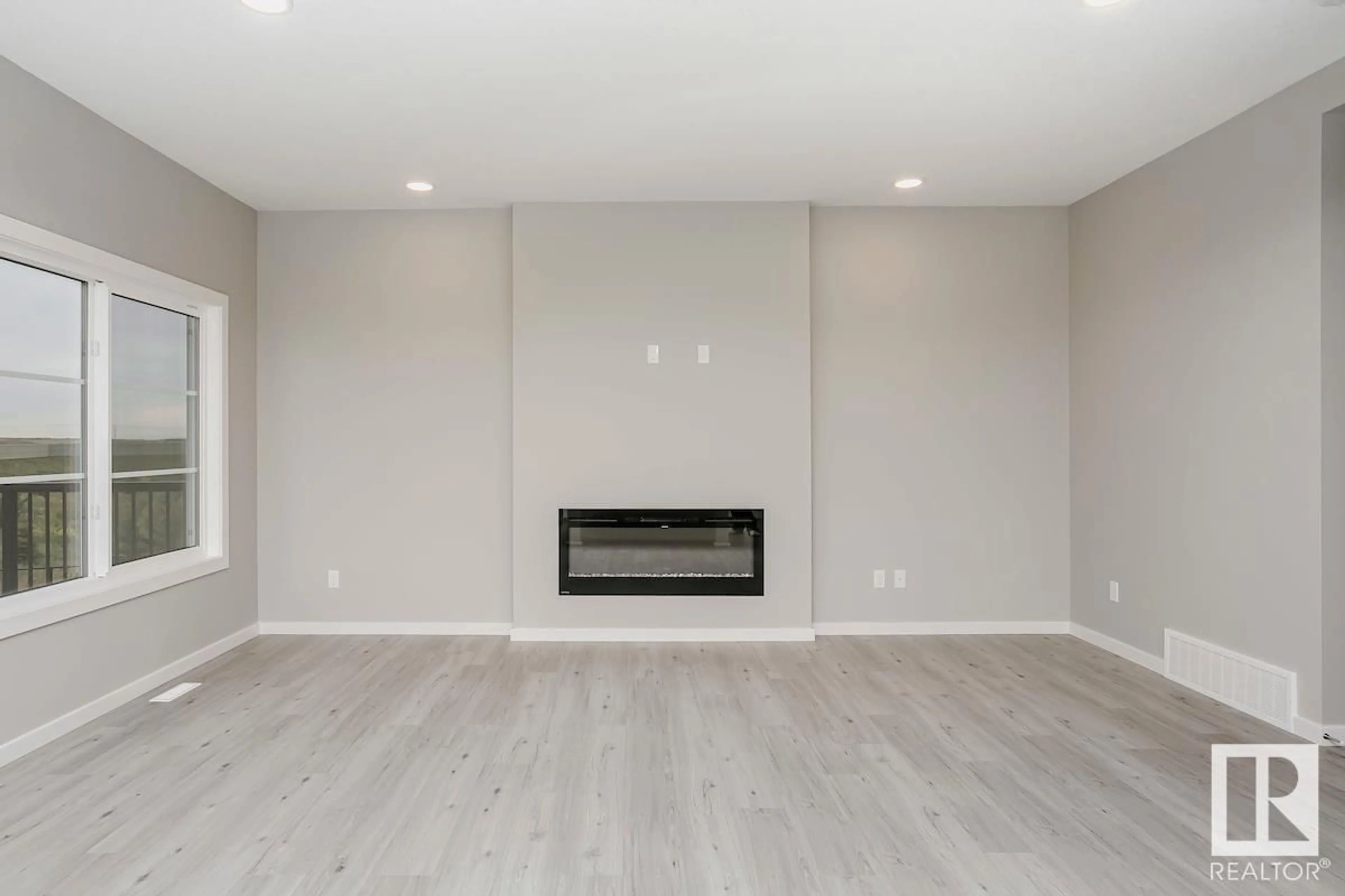 A pic of a room, wood floors for 674 KINGLET BV NW, Edmonton Alberta T5S0S7