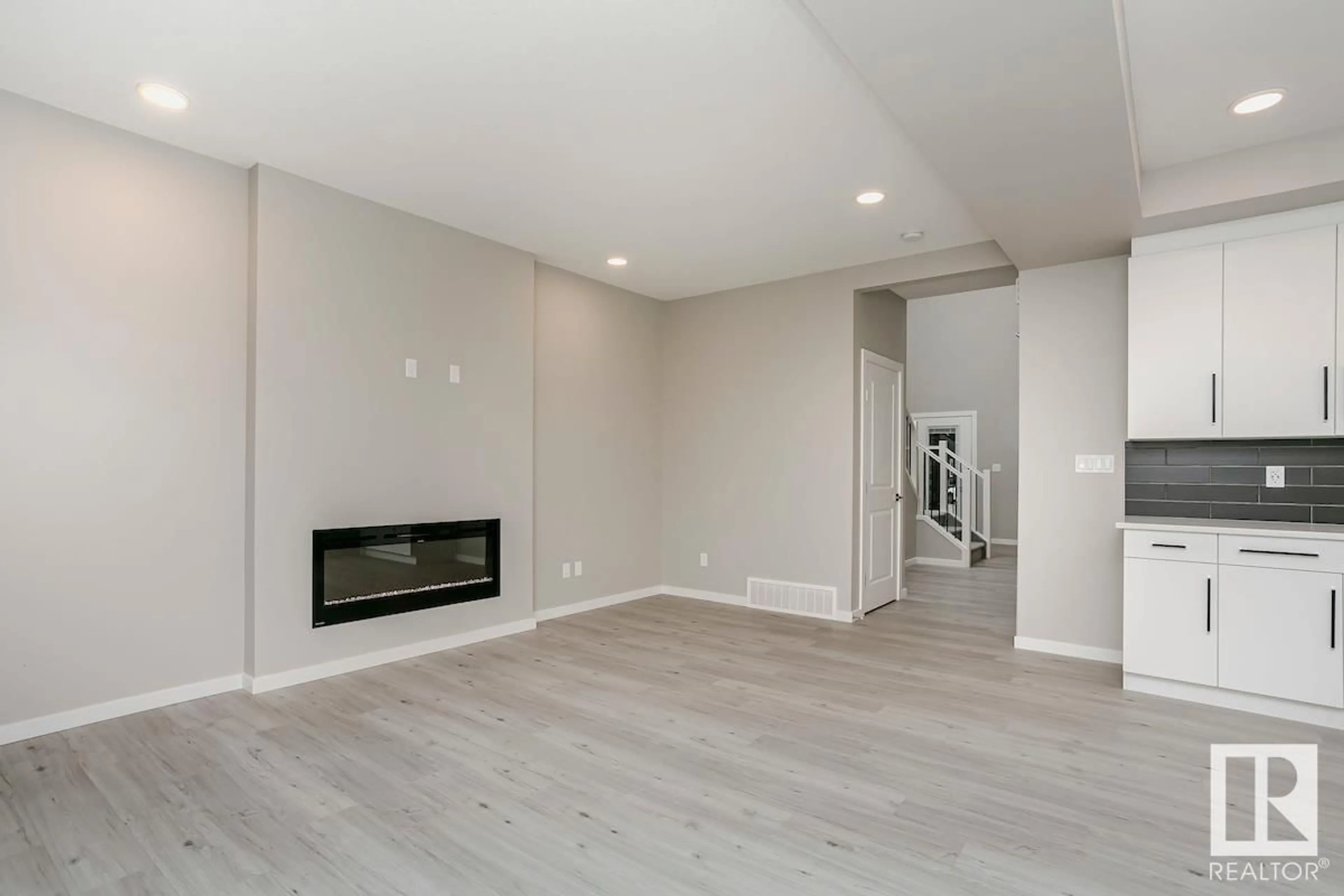 A pic of a room, wood floors for 674 KINGLET BV NW, Edmonton Alberta T5S0S7