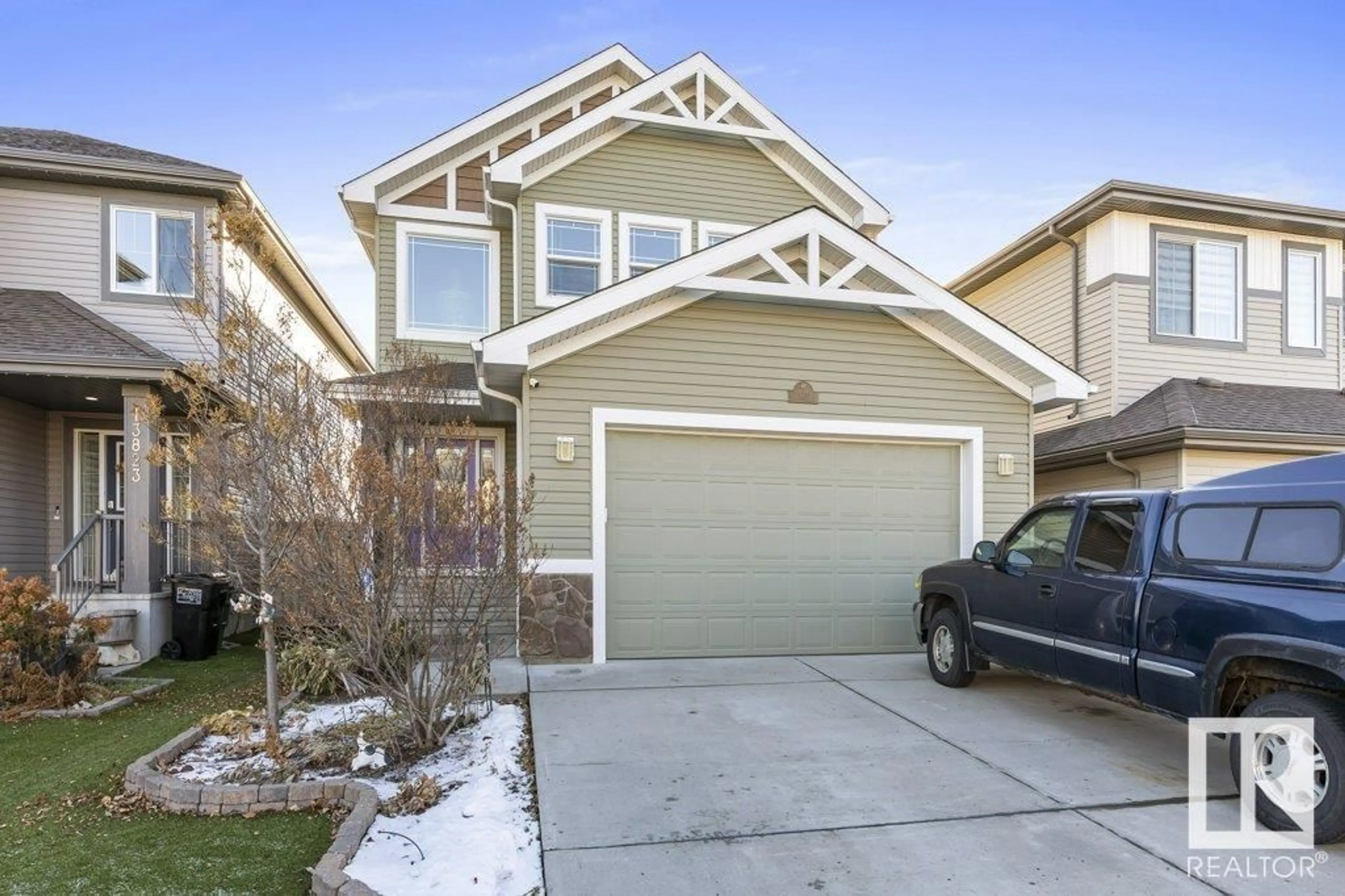 Frontside or backside of a home, the street view for 13827 142 AV NW, Edmonton Alberta T6V0L8