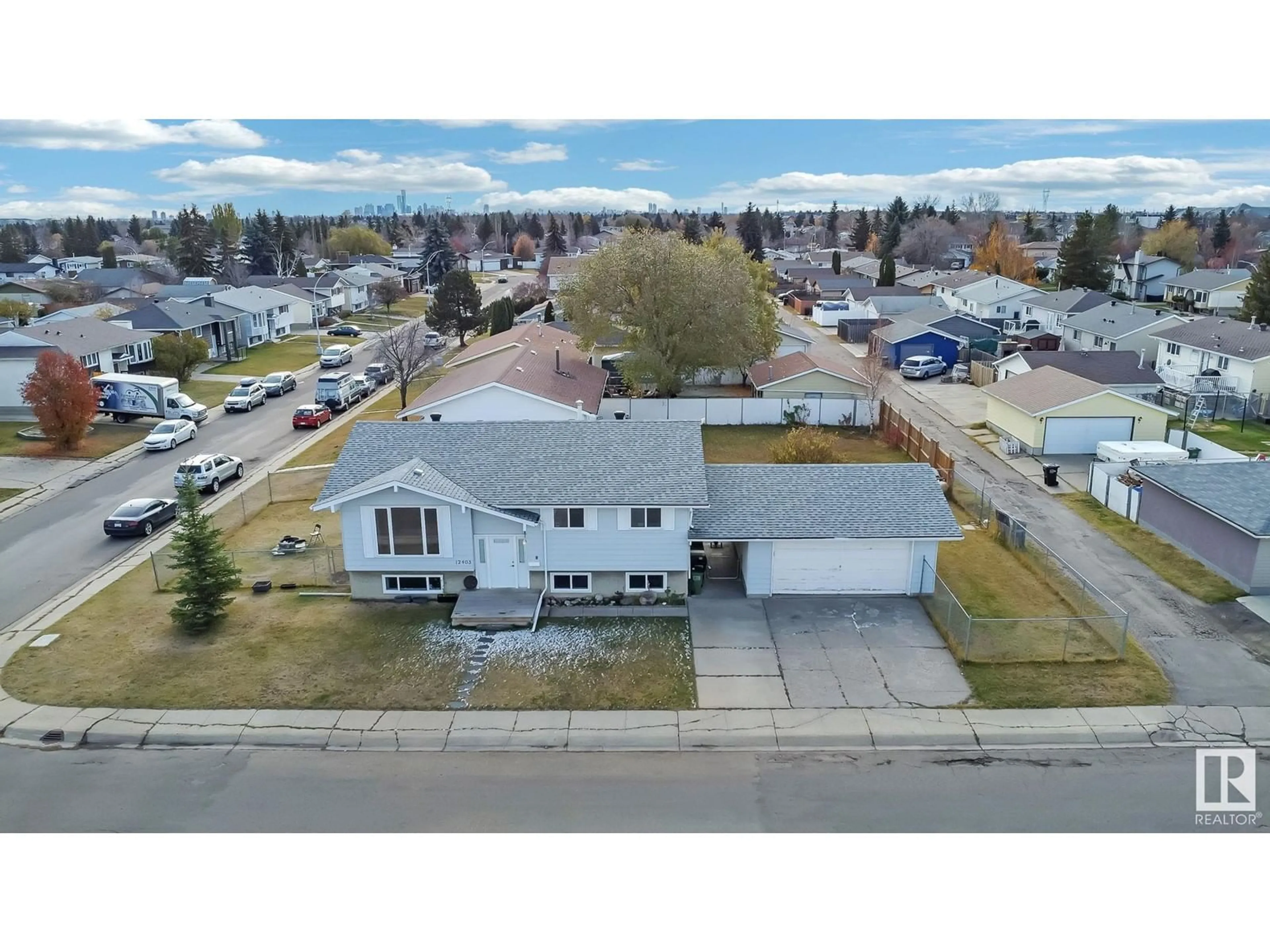 Frontside or backside of a home, the street view for 12403 159 AV NW, Edmonton Alberta T5X2Y4