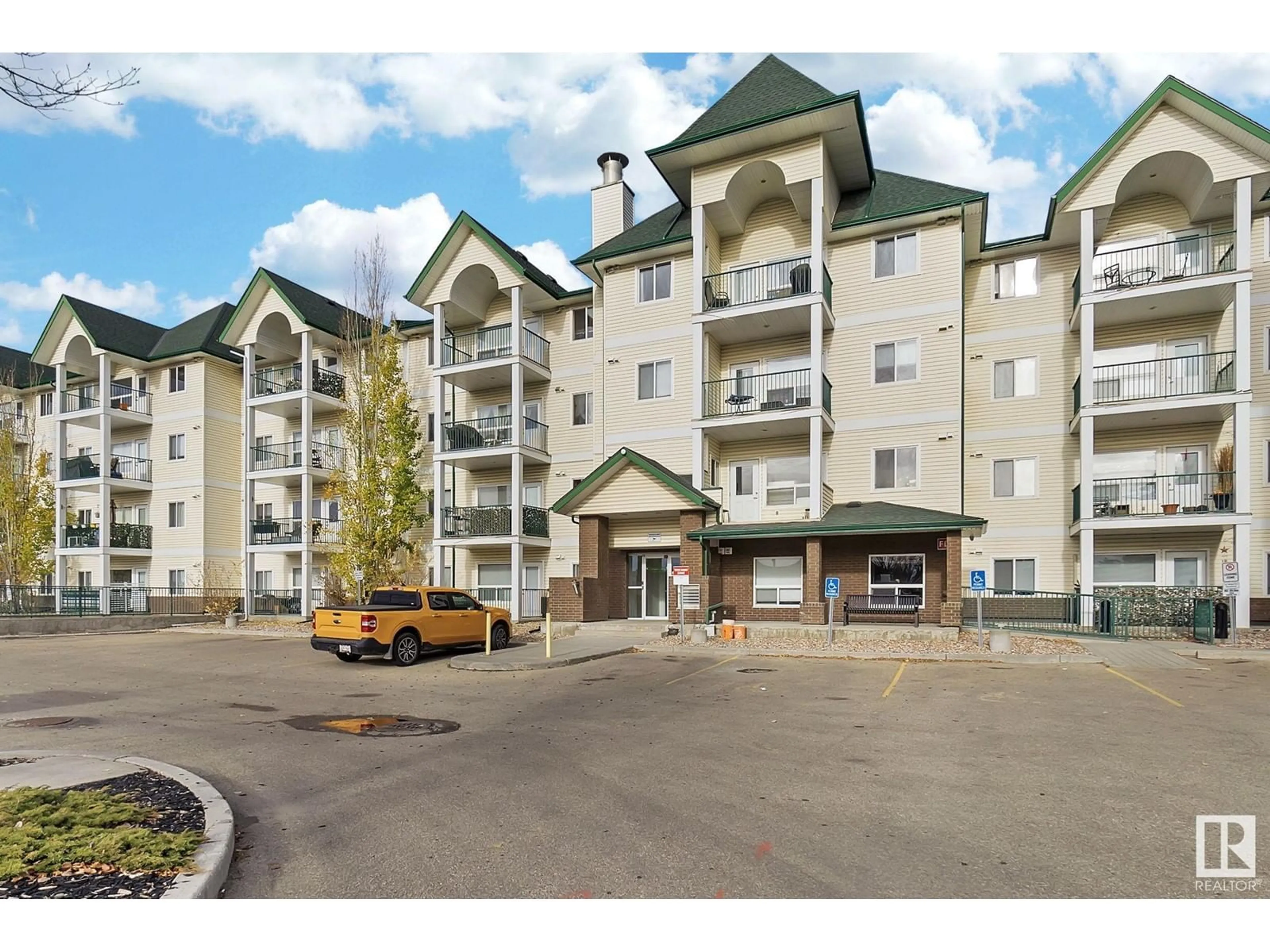 A pic from exterior of the house or condo, the front or back of building for #110 13635 34 ST NW, Edmonton Alberta T5A0C4