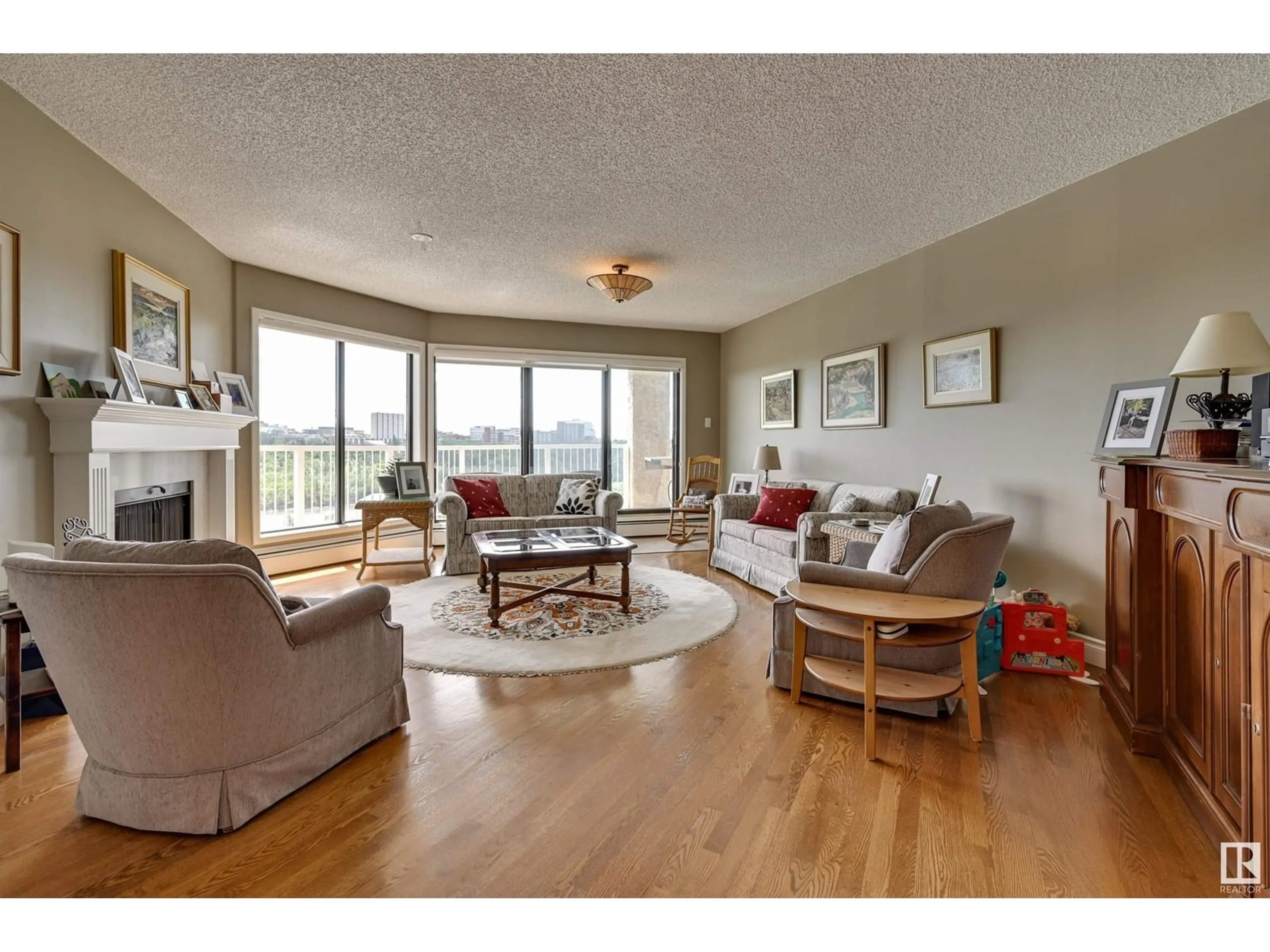 Living room, wood floors for #10 9734 111 ST NW, Edmonton Alberta T5K1J8