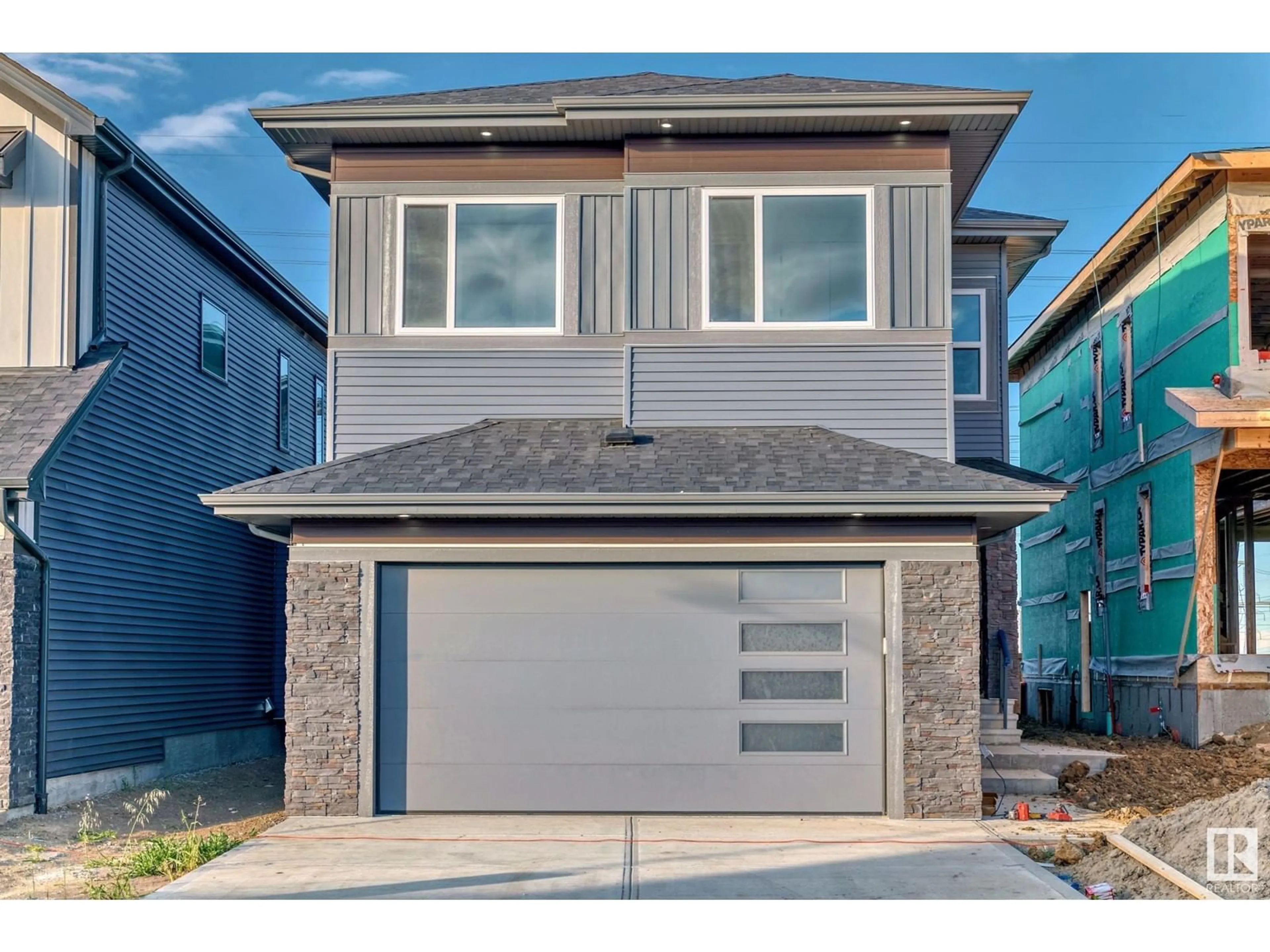 Frontside or backside of a home for 2756 1 AV SW, Edmonton Alberta T6X3E3