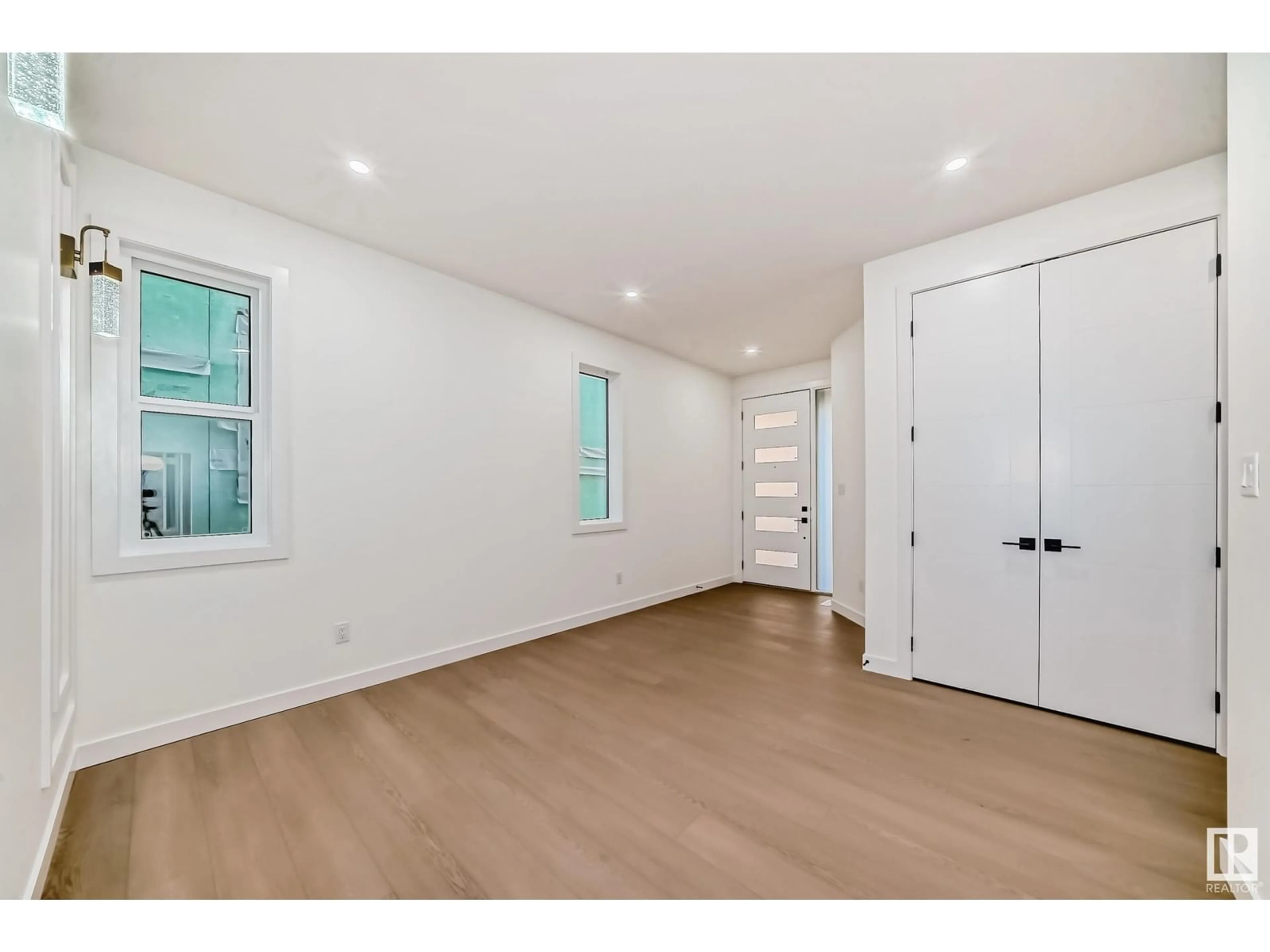 Indoor entryway, wood floors for 2756 1 AV SW, Edmonton Alberta T6X3E3