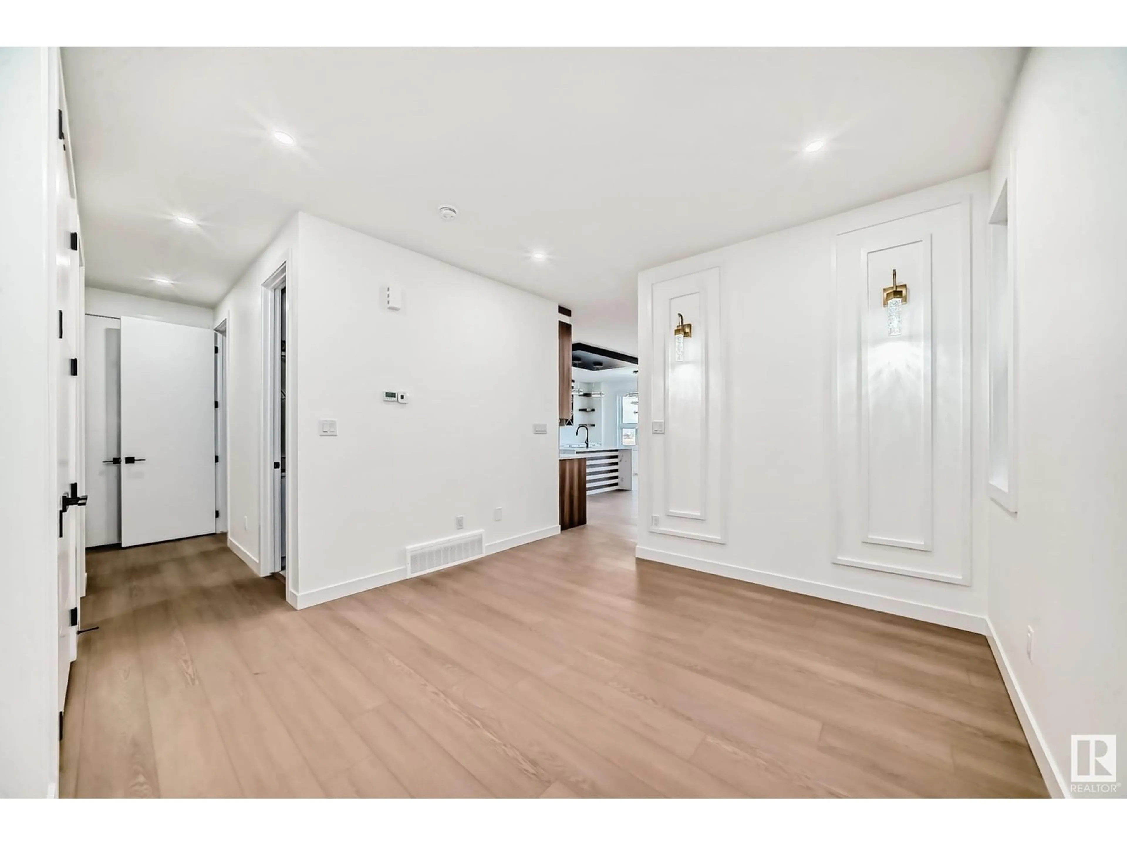 Indoor entryway, wood floors for 2756 1 AV SW, Edmonton Alberta T6X3E3