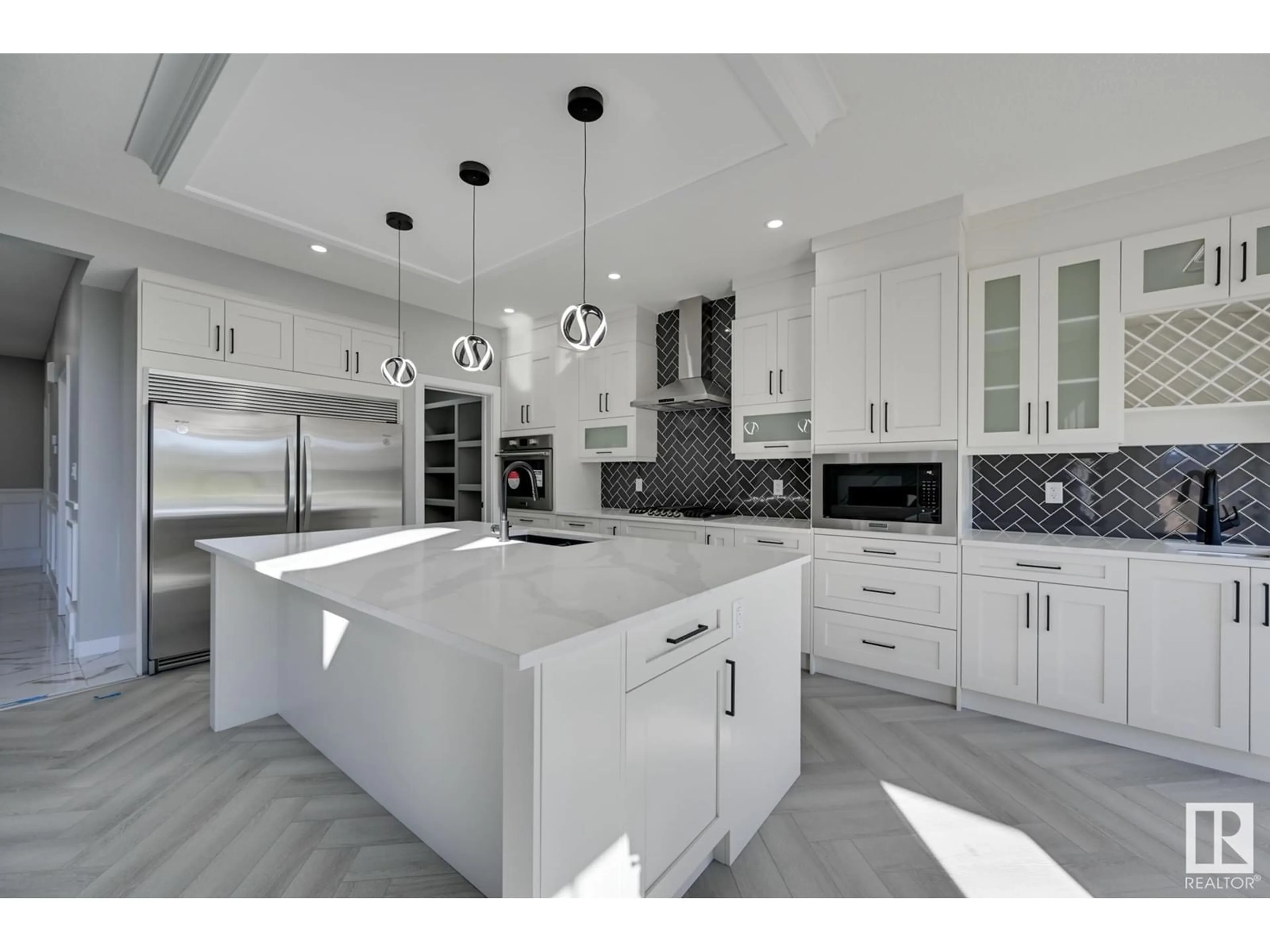 Contemporary kitchen, wood floors, mountain for 1379 SISKIN WD NW, Edmonton Alberta T5S0R3