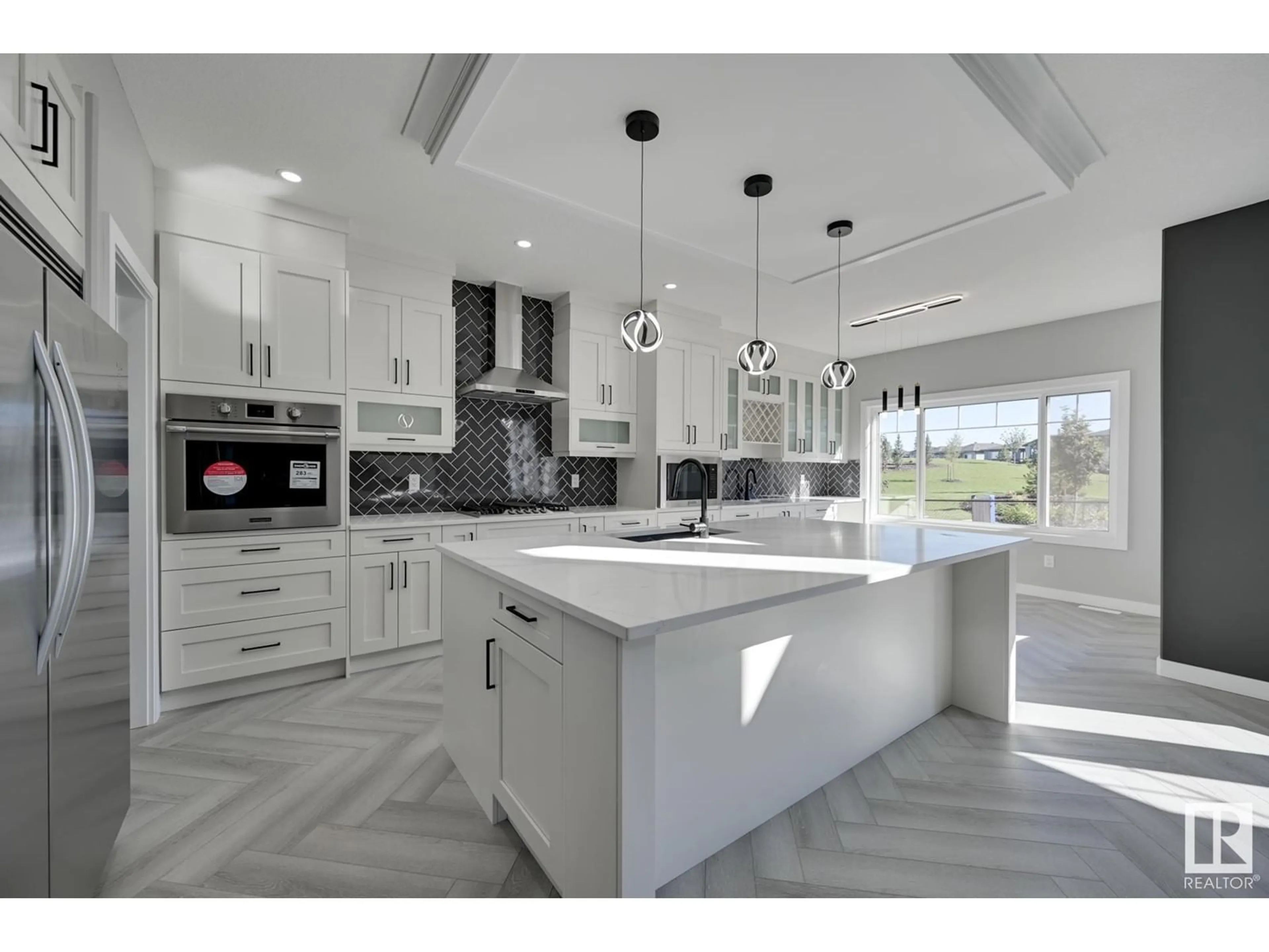 Contemporary kitchen, wood floors, mountain for 1379 SISKIN WD NW, Edmonton Alberta T5S0R3