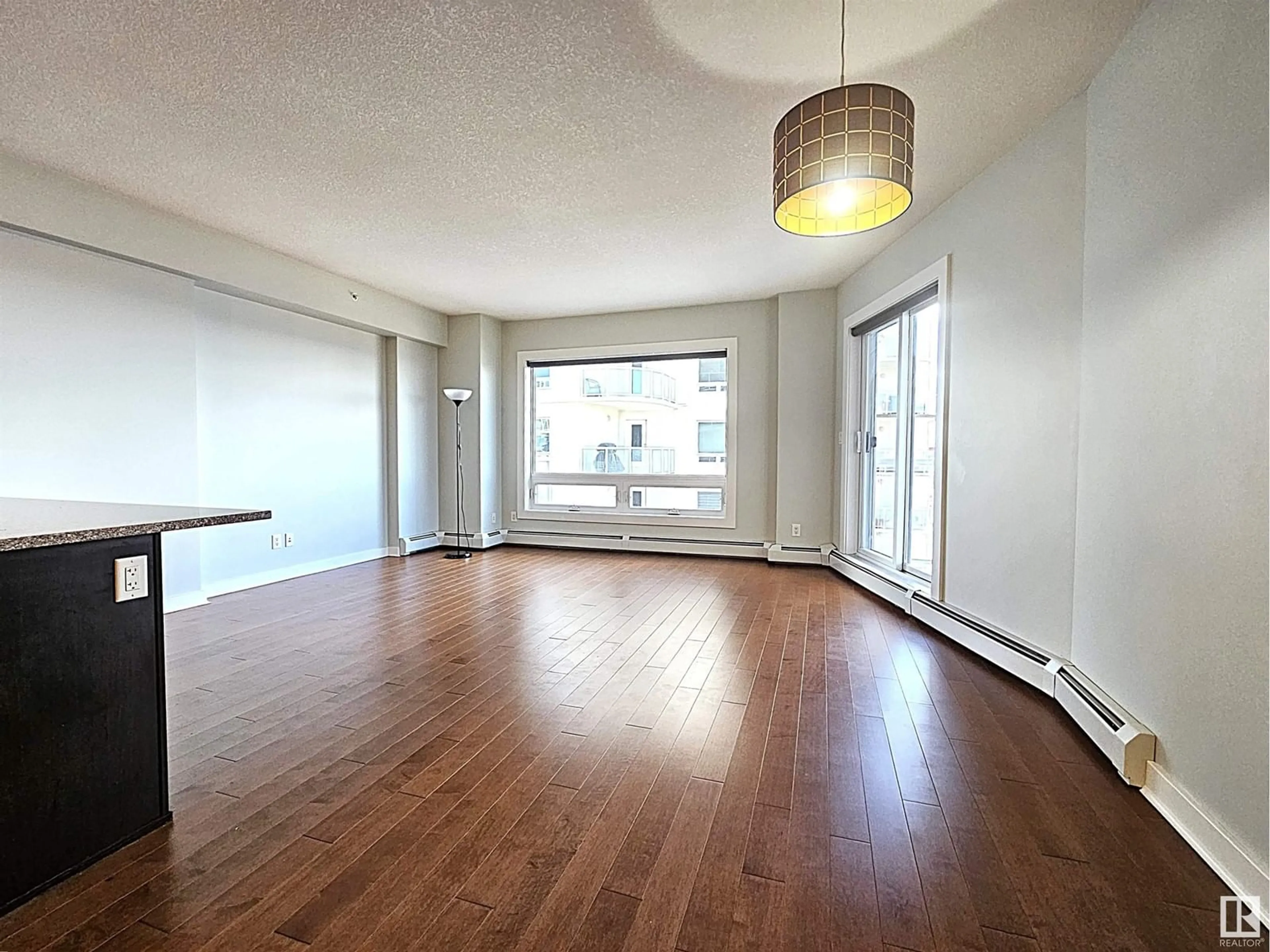 A pic of a room, wood floors for #2505 10152 104 ST NW, Edmonton Alberta T5J0B6