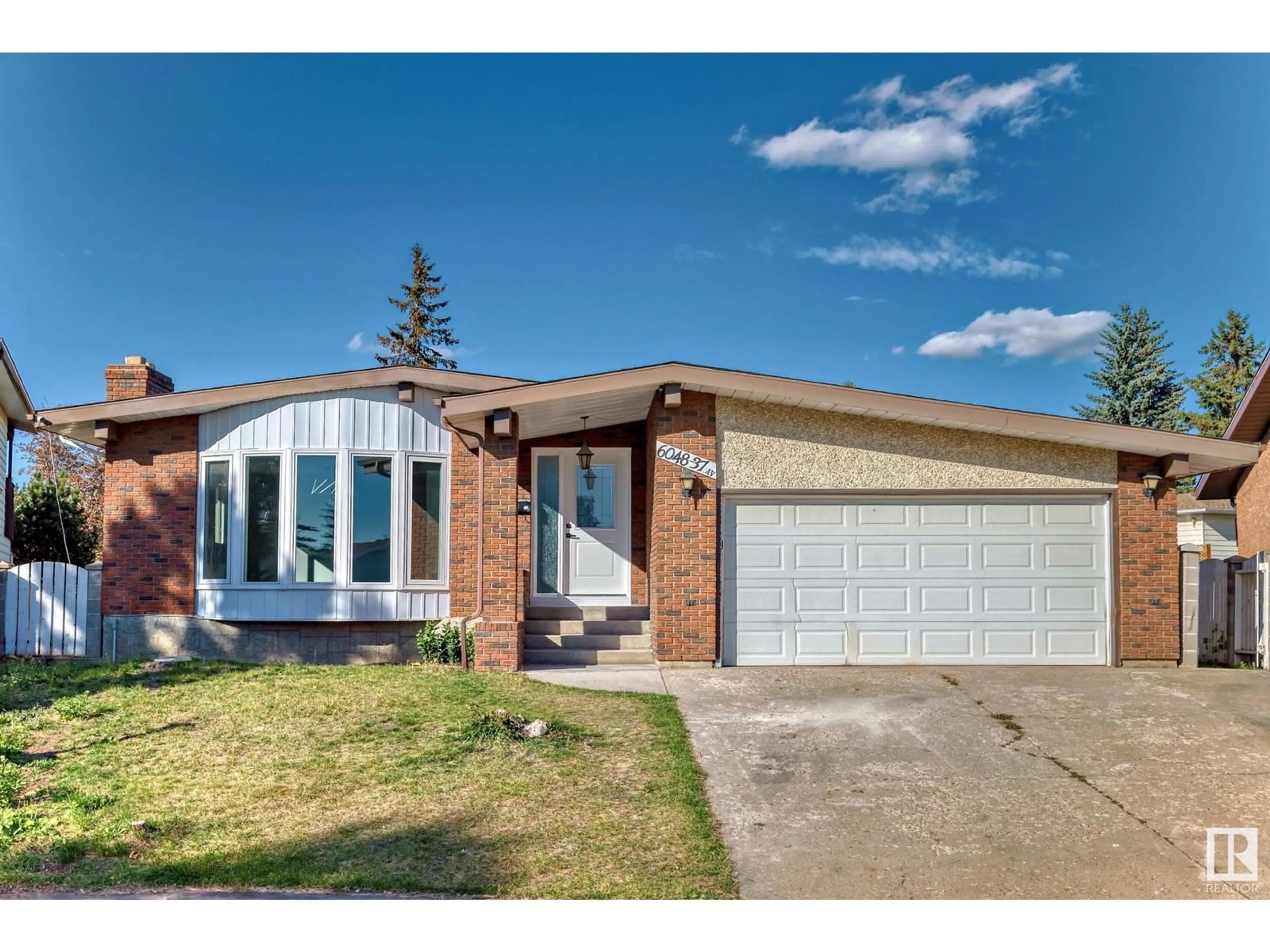 Home with brick exterior material for 6048 37 AV NW NW, Edmonton Alberta T6L1H2