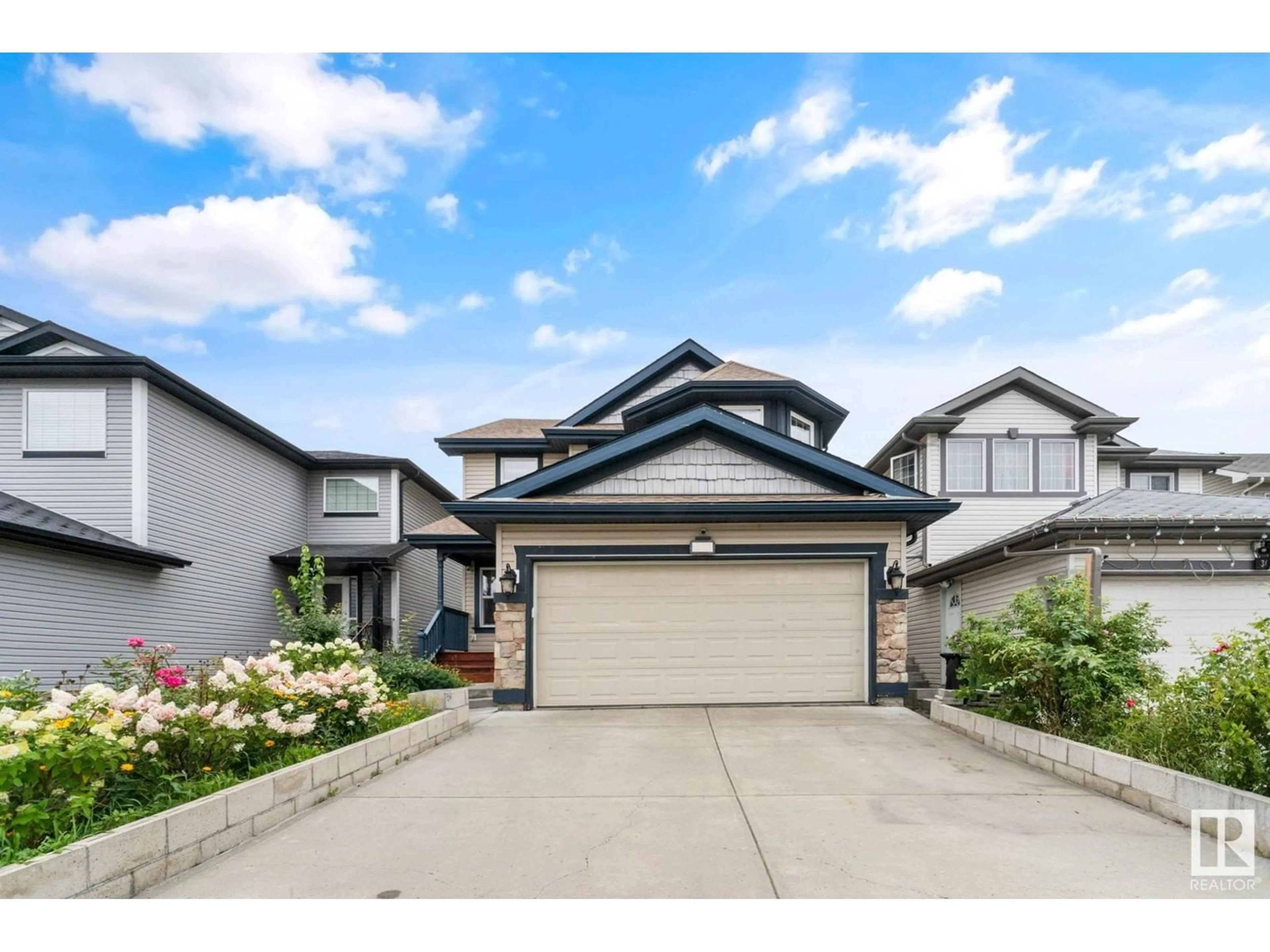 Frontside or backside of a home, the street view for 2923 24 AV NW, Edmonton Alberta T6T0G7