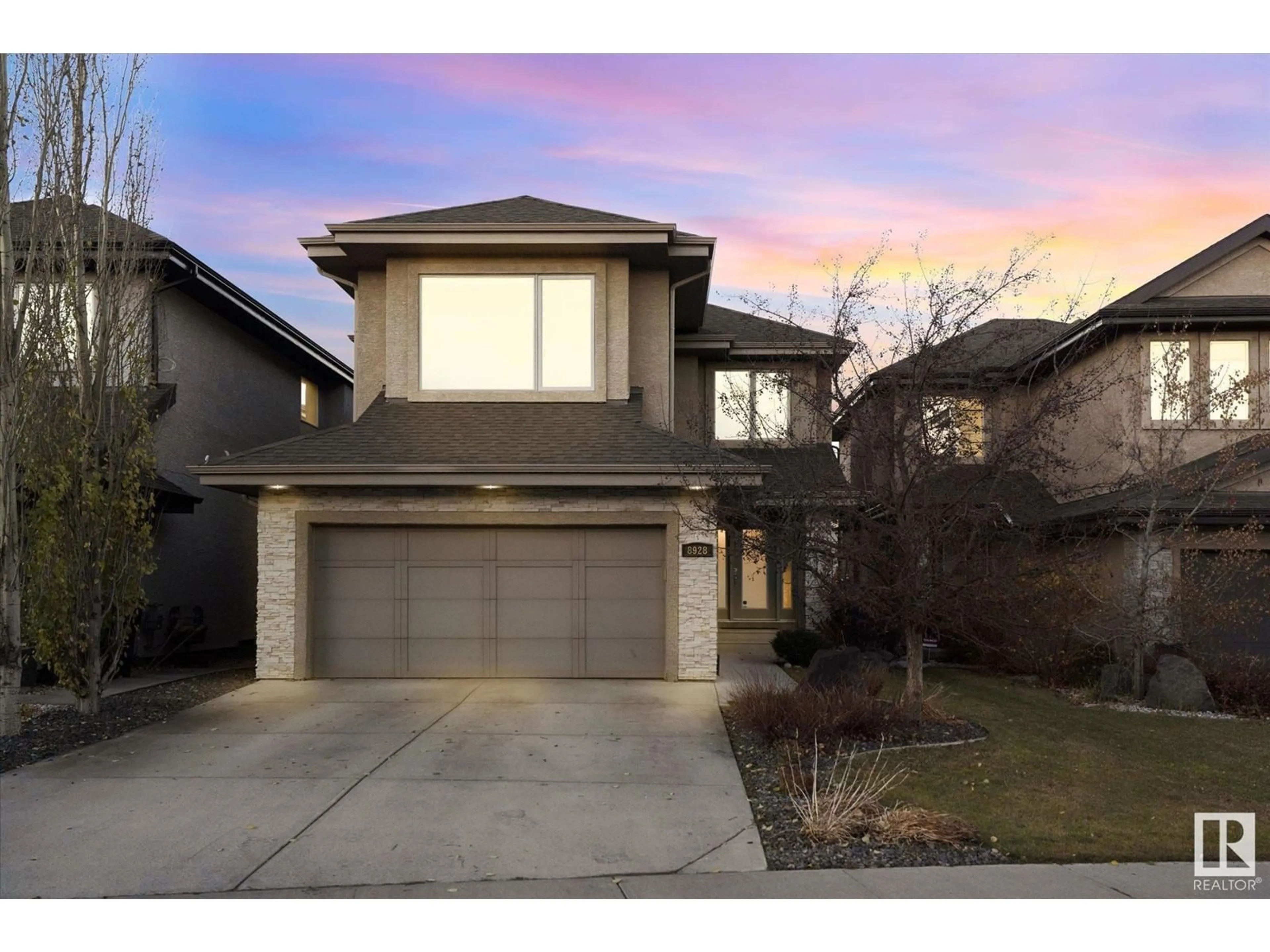 Frontside or backside of a home, the street view for 8928 181 AV NW, Edmonton Alberta T5Z0J5