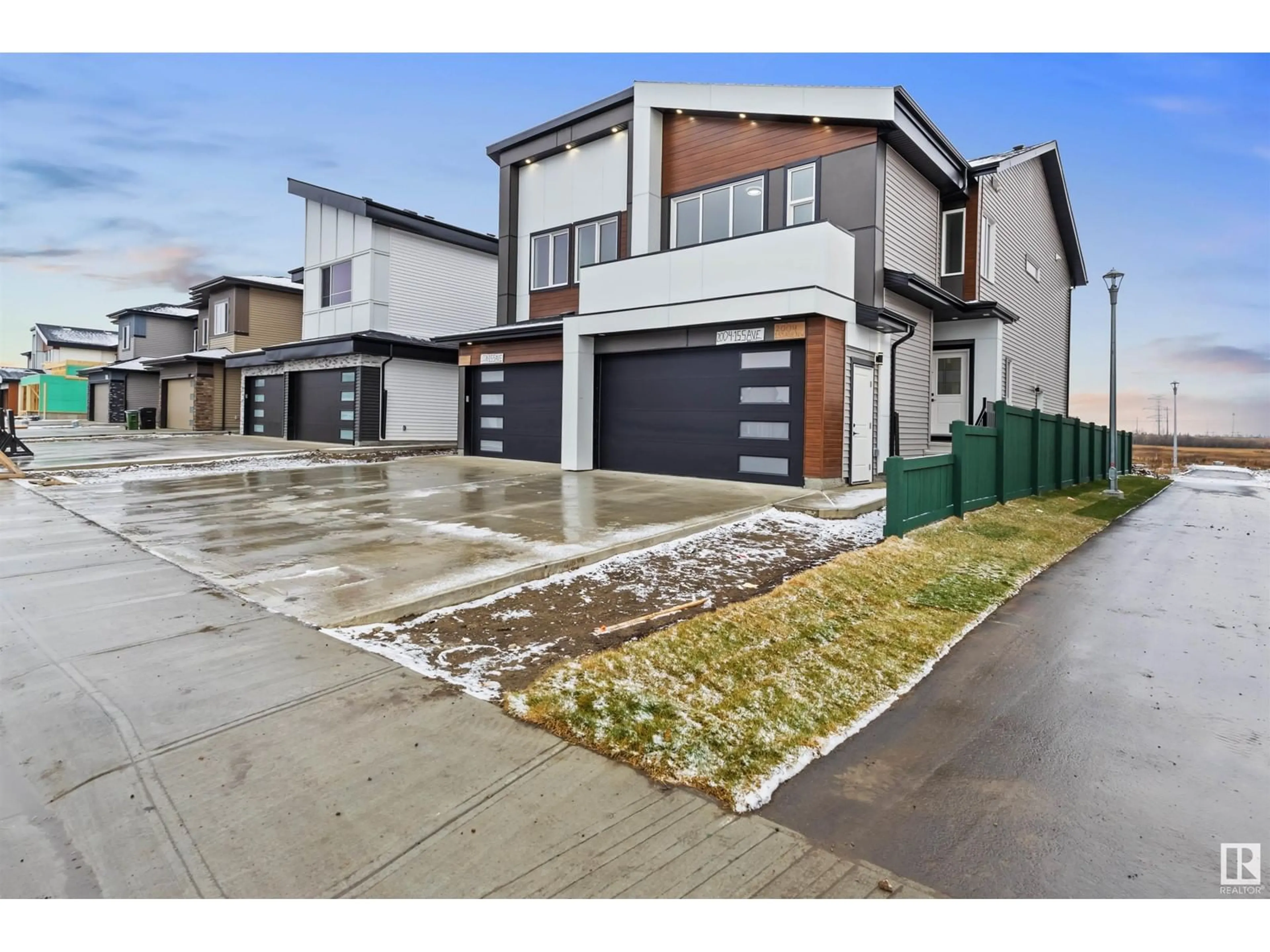 Frontside or backside of a home, the street view for 2004 155 AV NW, Edmonton Alberta T5Y6C5