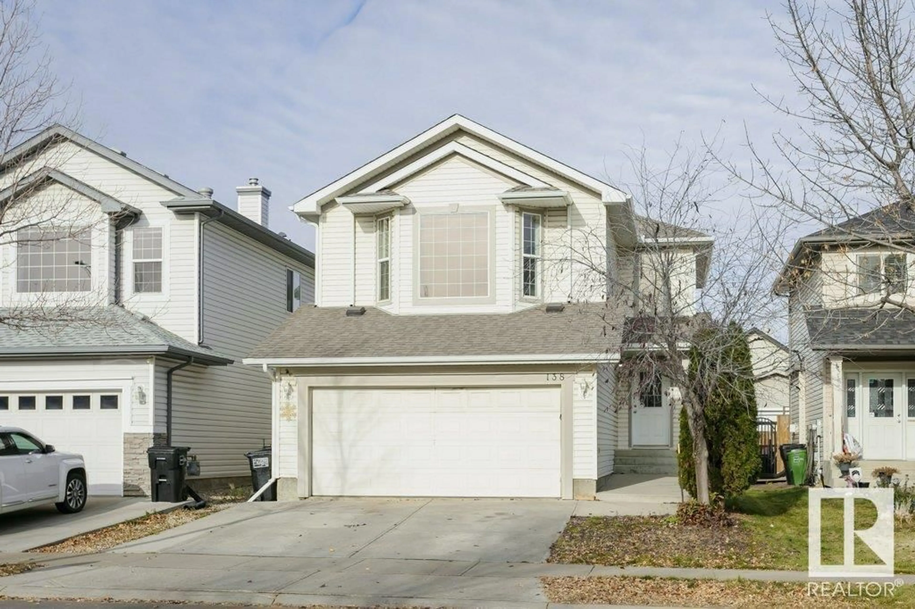 Frontside or backside of a home, the street view for 138 MACEWAN RD SW, Edmonton Alberta T6W1K8