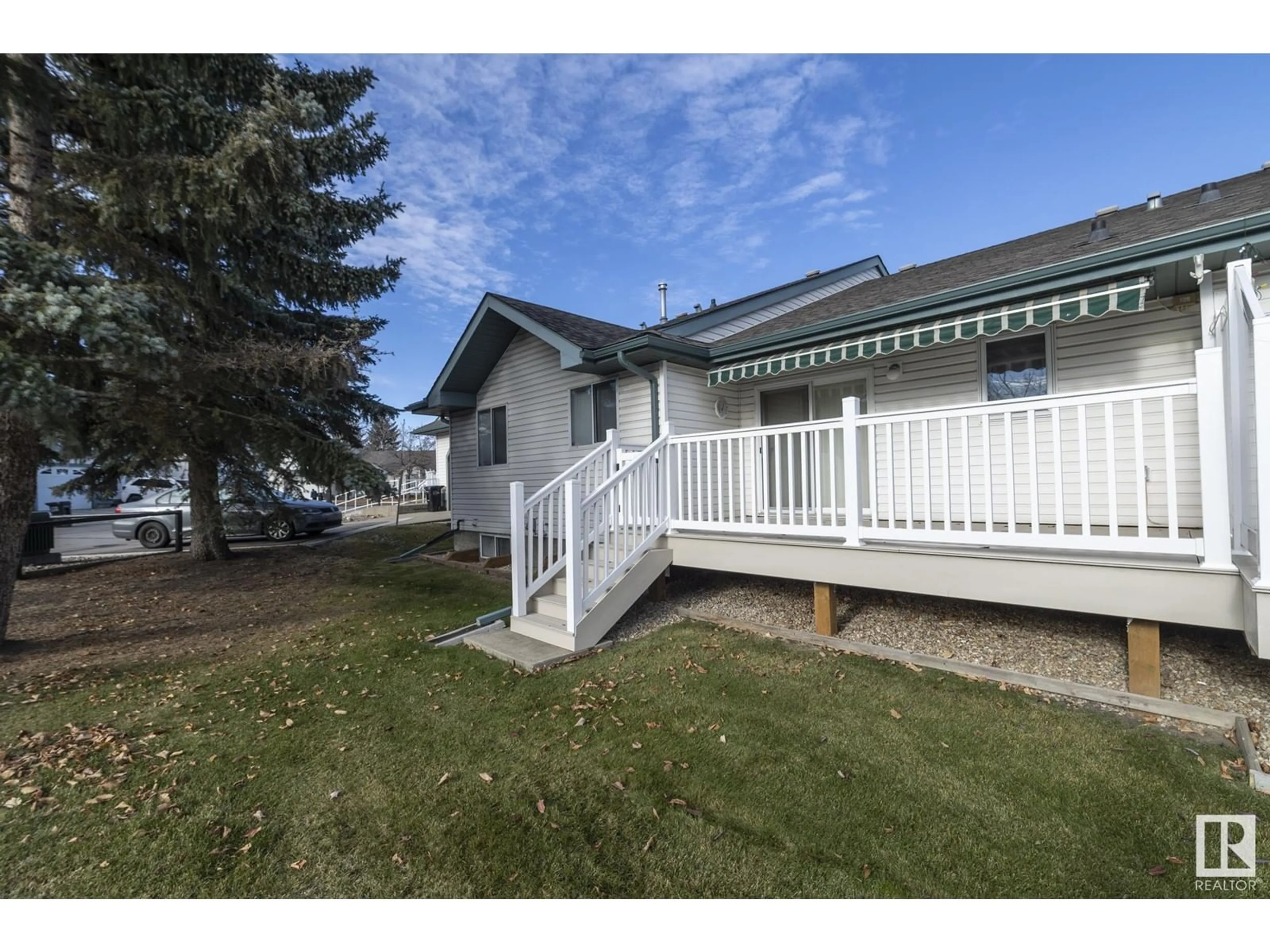 A pic from exterior of the house or condo, the fenced backyard for #20 308 Jackson RD NW, Edmonton Alberta T6L6W1