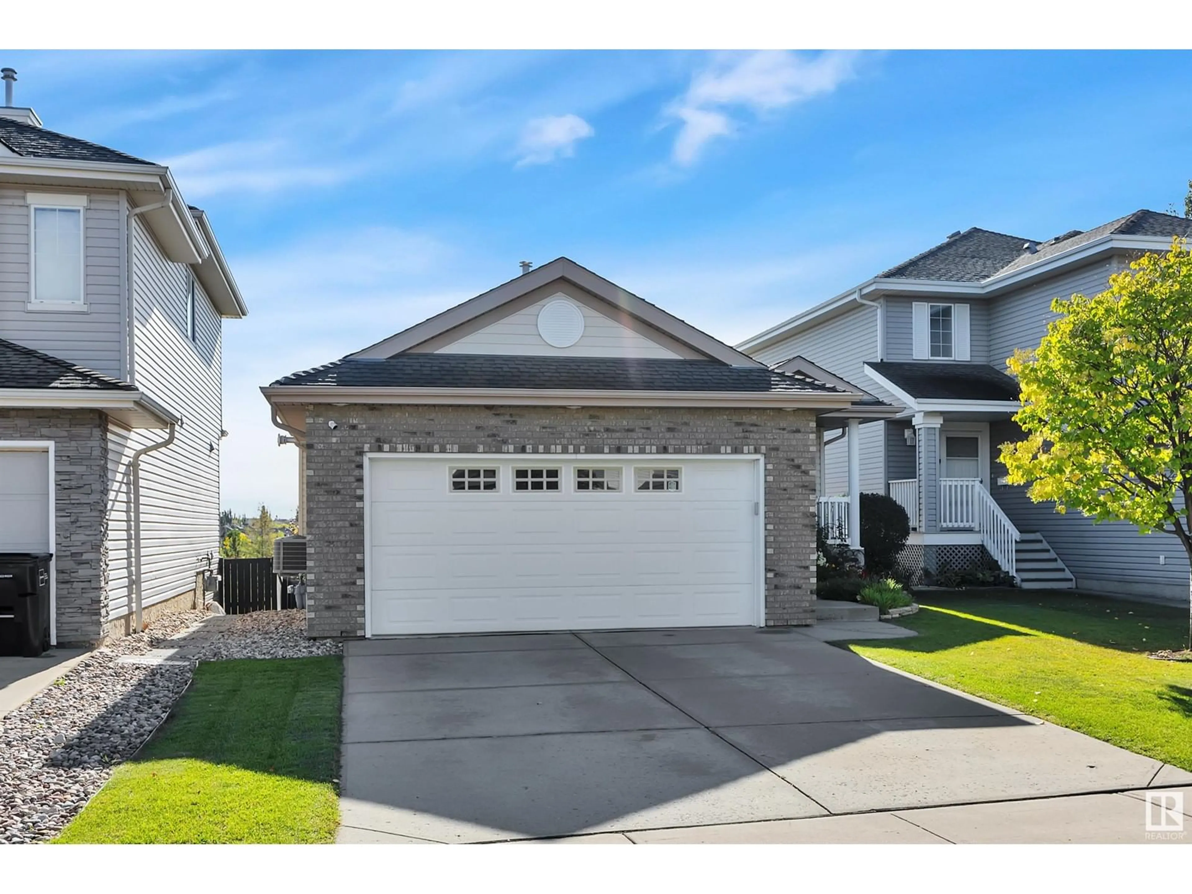 Frontside or backside of a home, the street view for 2323 TAYLOR CL NW, Edmonton Alberta T6R3J7