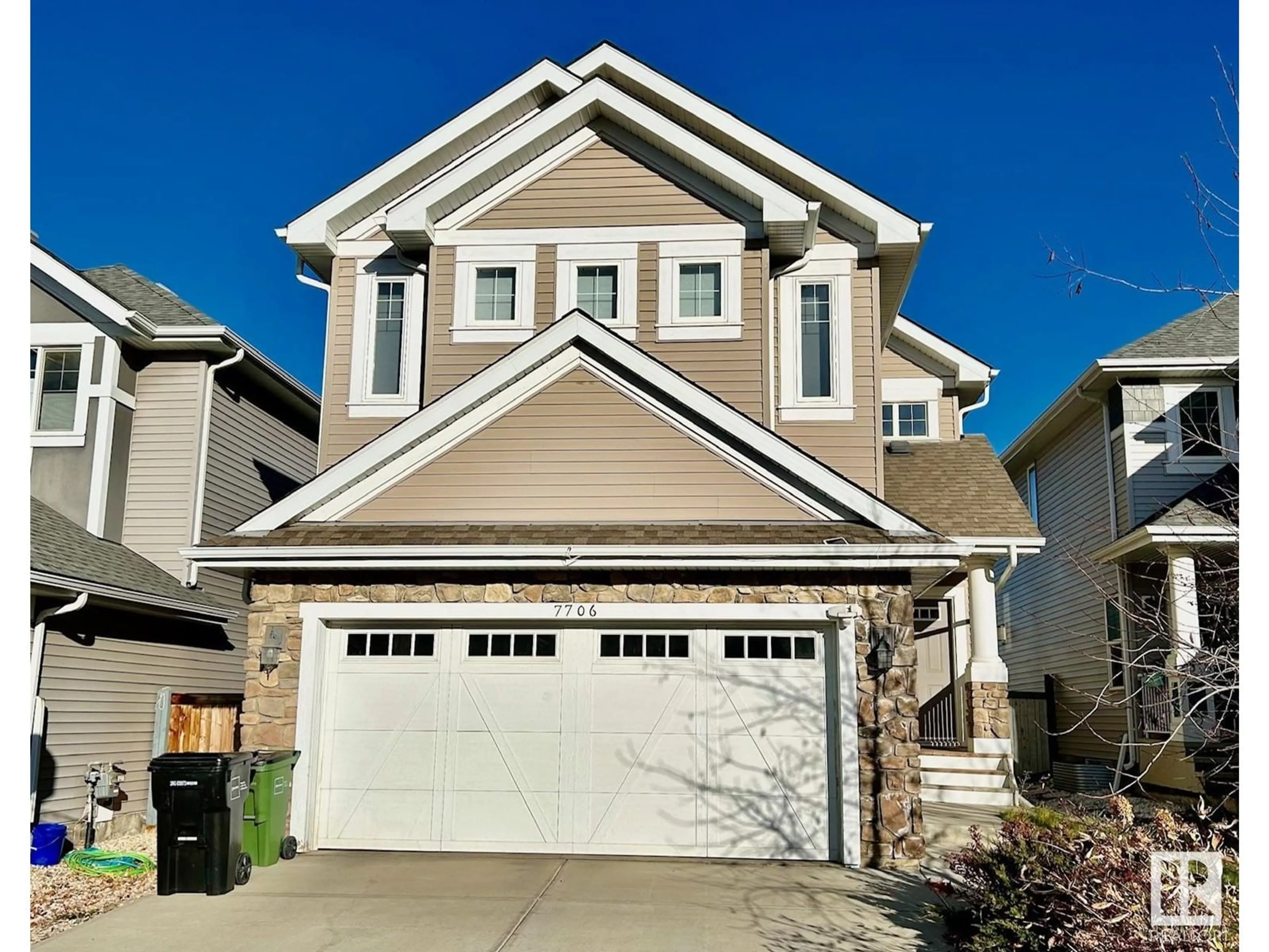 Frontside or backside of a home, the street view for 7706 20A AV SW, Edmonton Alberta T6X1W4