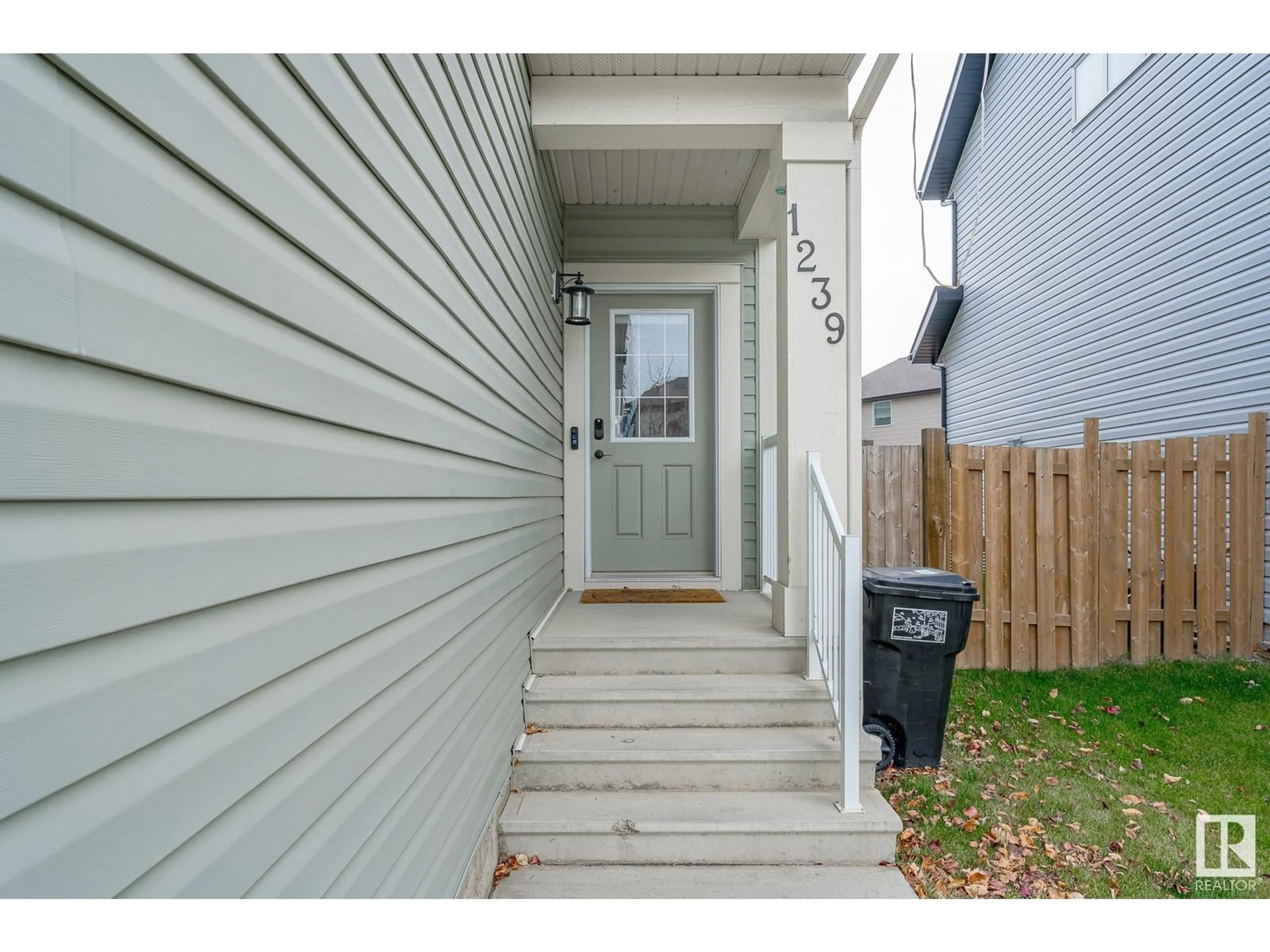 A pic from exterior of the house or condo, the fenced backyard for 1239 MCCONACHIE BV NW, Edmonton Alberta T5Y3T1