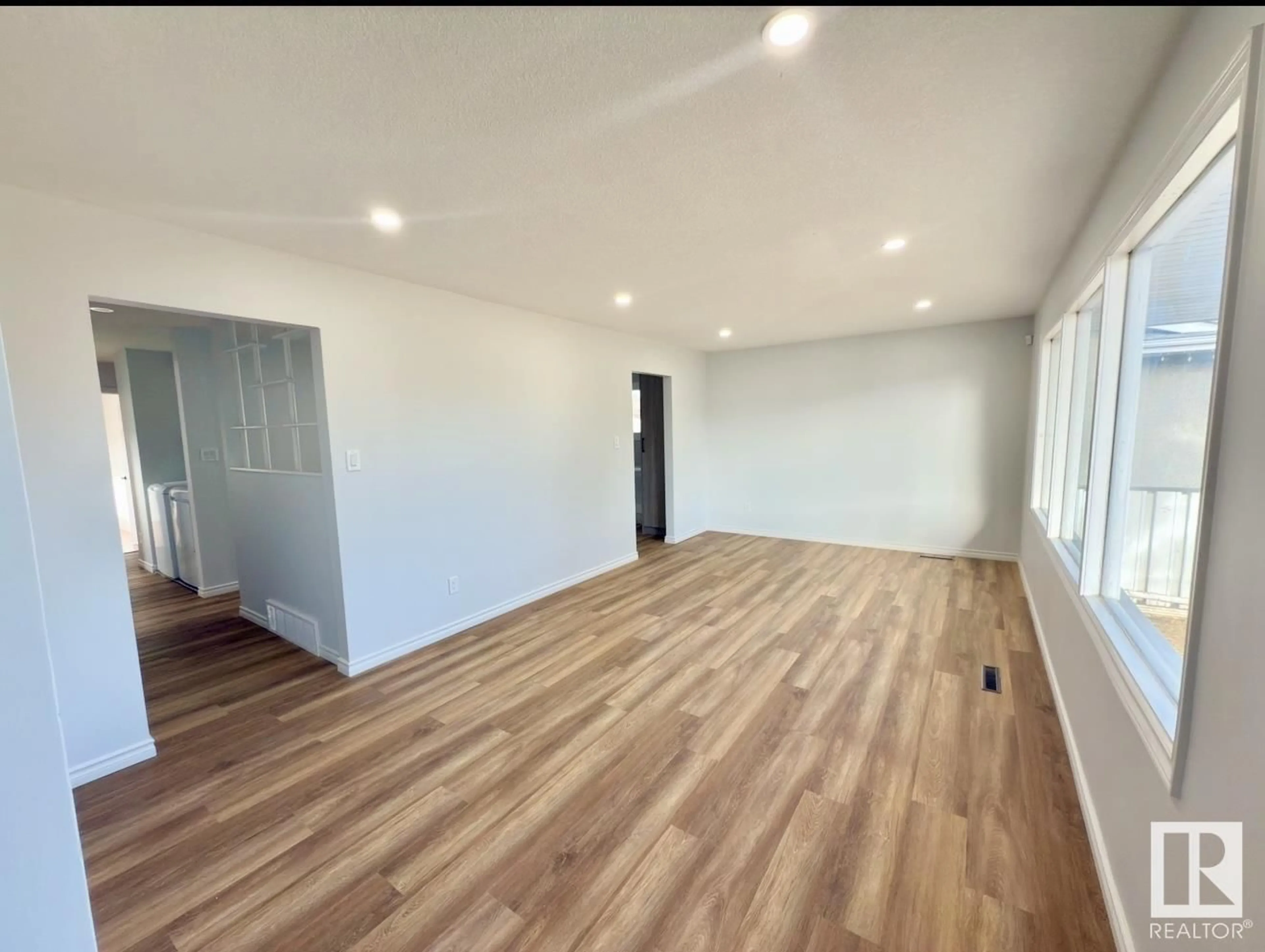 A pic of a room, wood floors for 13208 102 ST NW, Edmonton Alberta T5E4J8