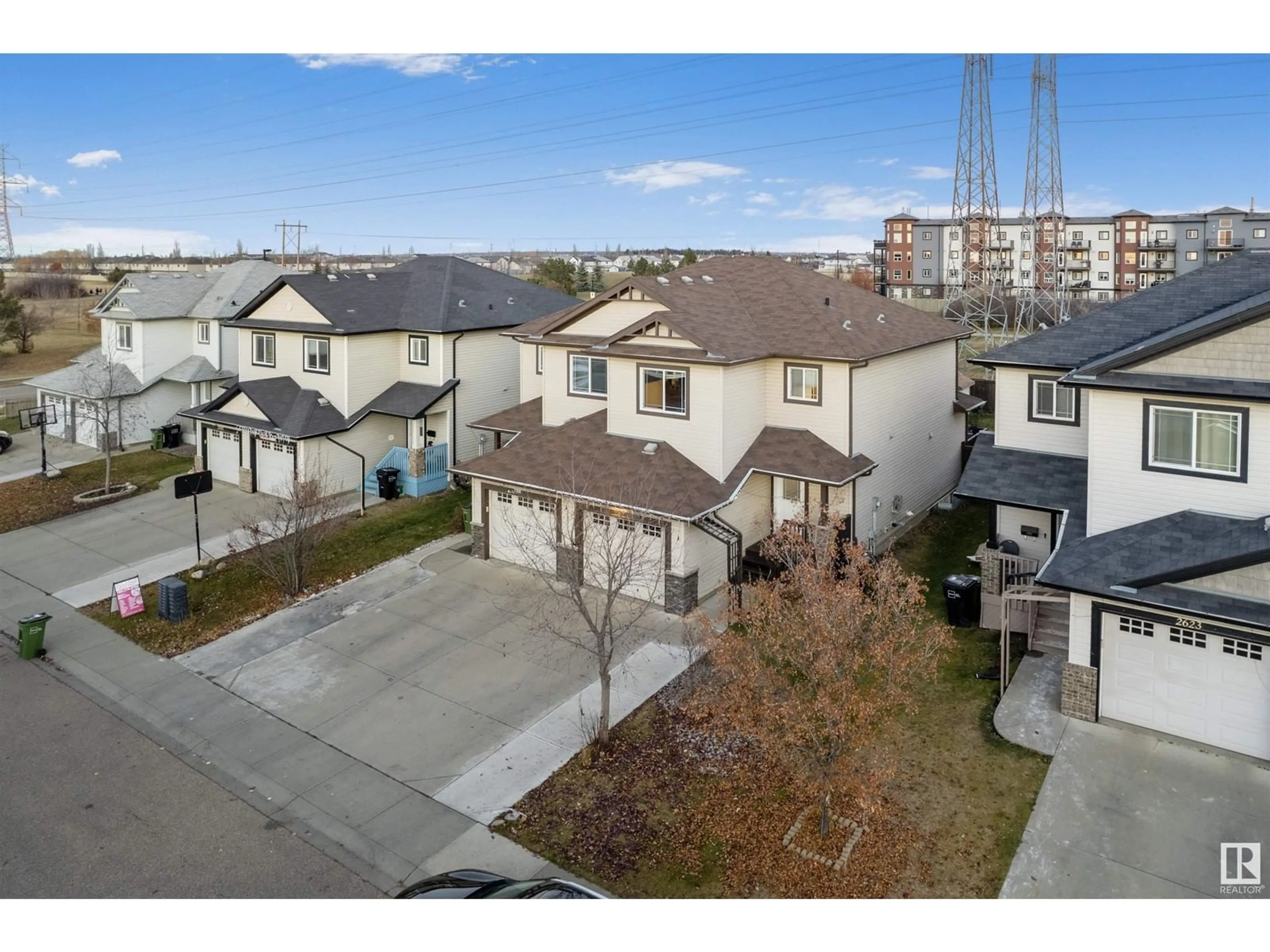 A pic from exterior of the house or condo, the fenced backyard for 2627 29 ST NW, Edmonton Alberta T6T0G8