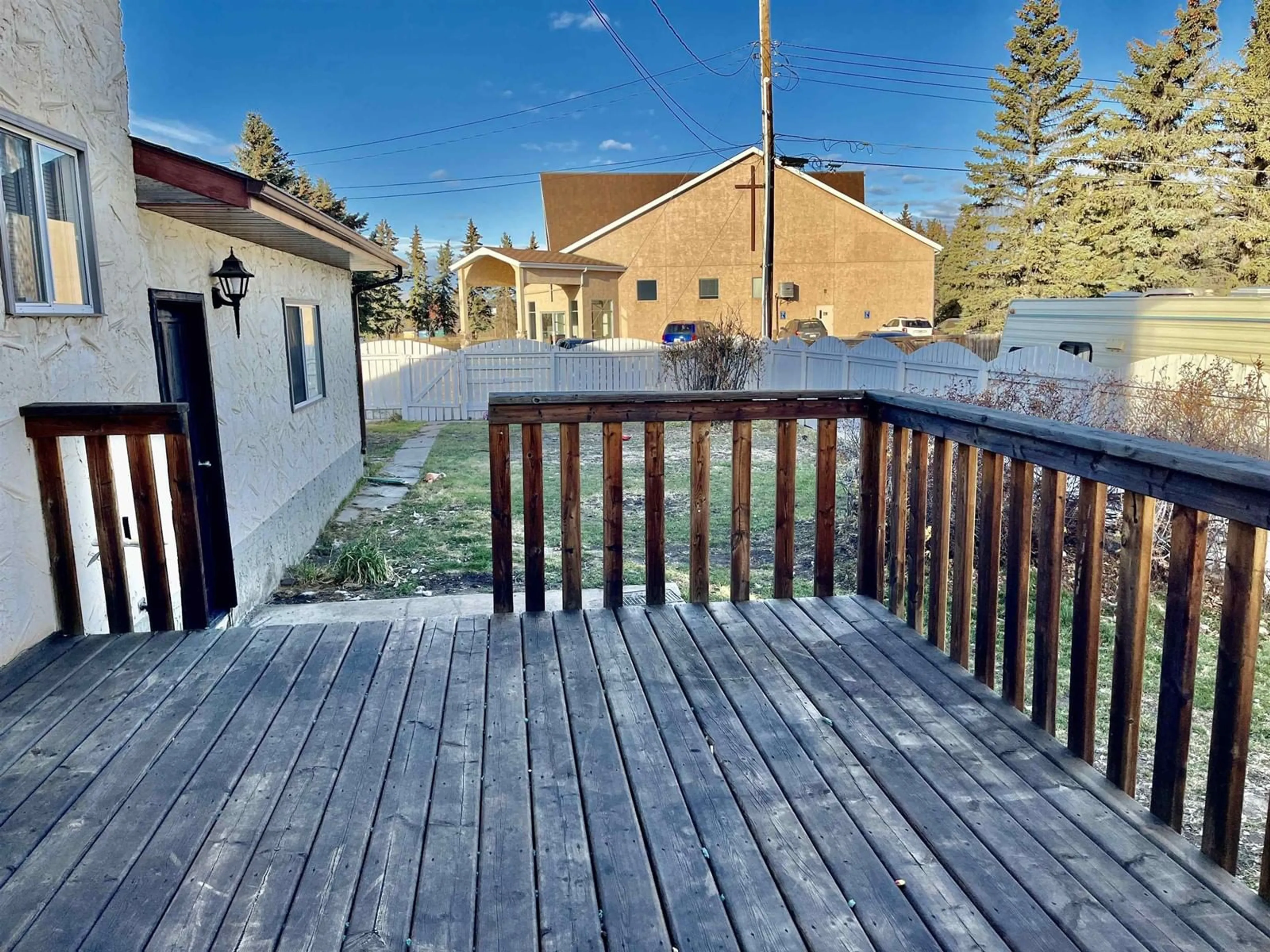 Patio, the fenced backyard for 5342 45 AV, Vegreville Alberta T9C1X2