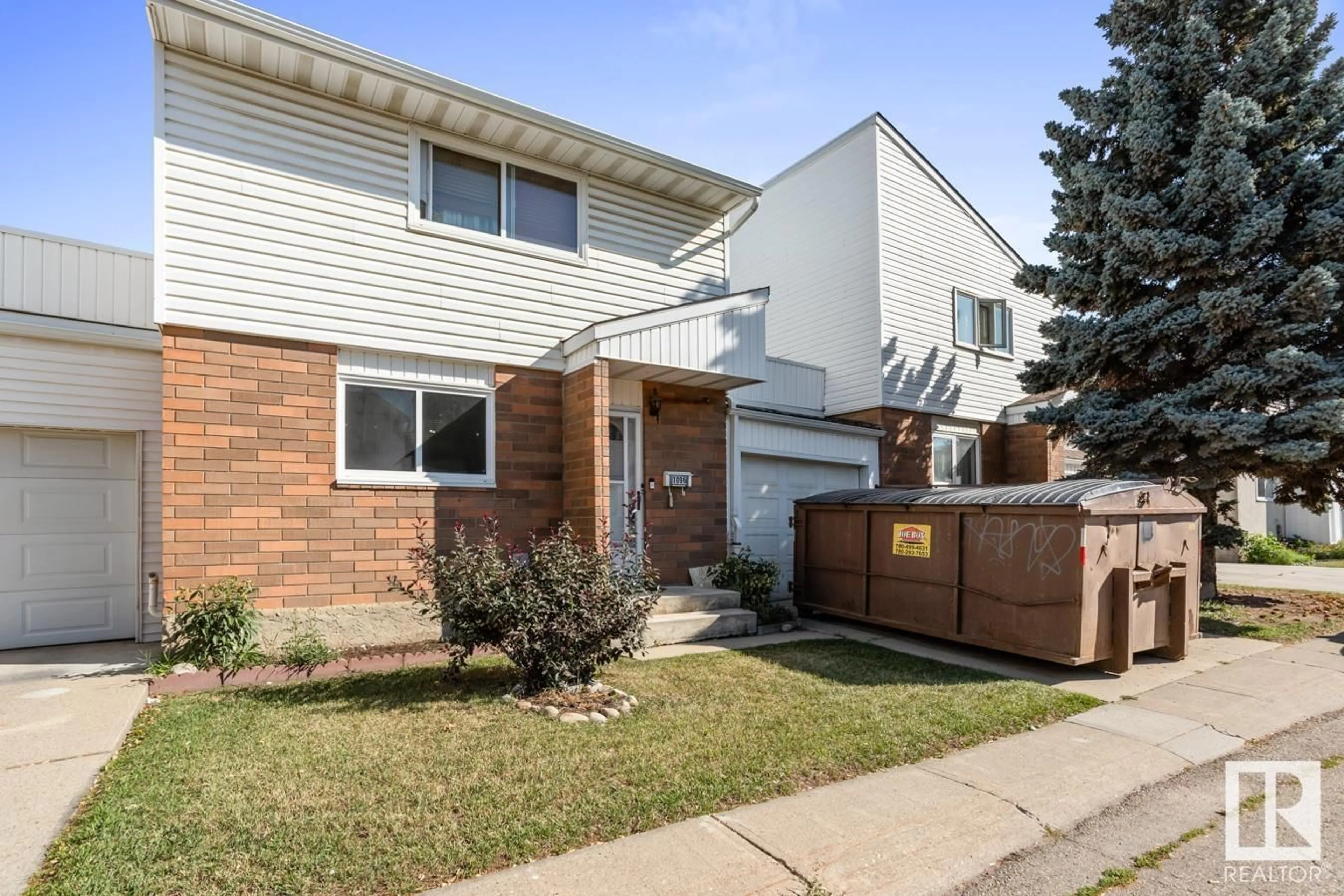 A pic from exterior of the house or condo, the fenced backyard for 1096 MILLBOURNE RD NW, Edmonton Alberta T6K1W1