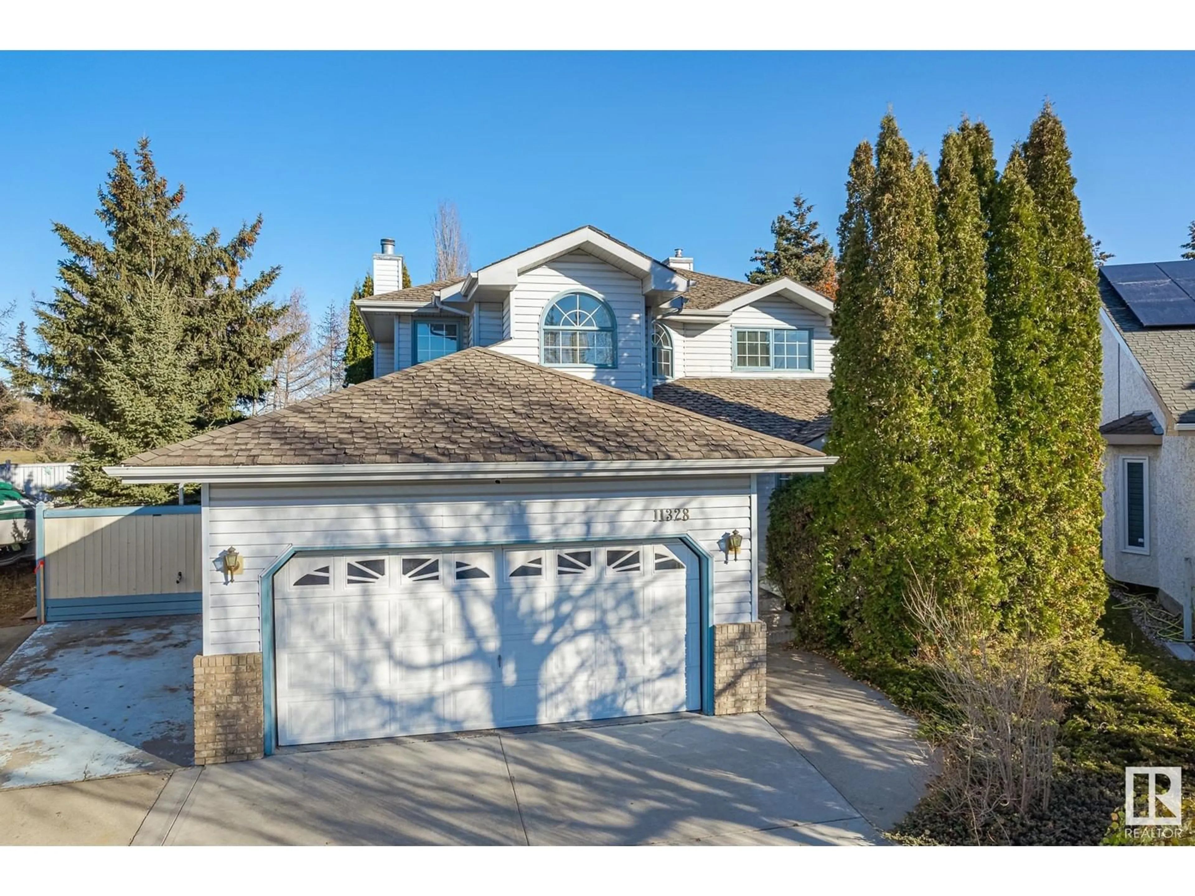 Frontside or backside of a home for 11328 10 AV NW, Edmonton Alberta T6J6S9