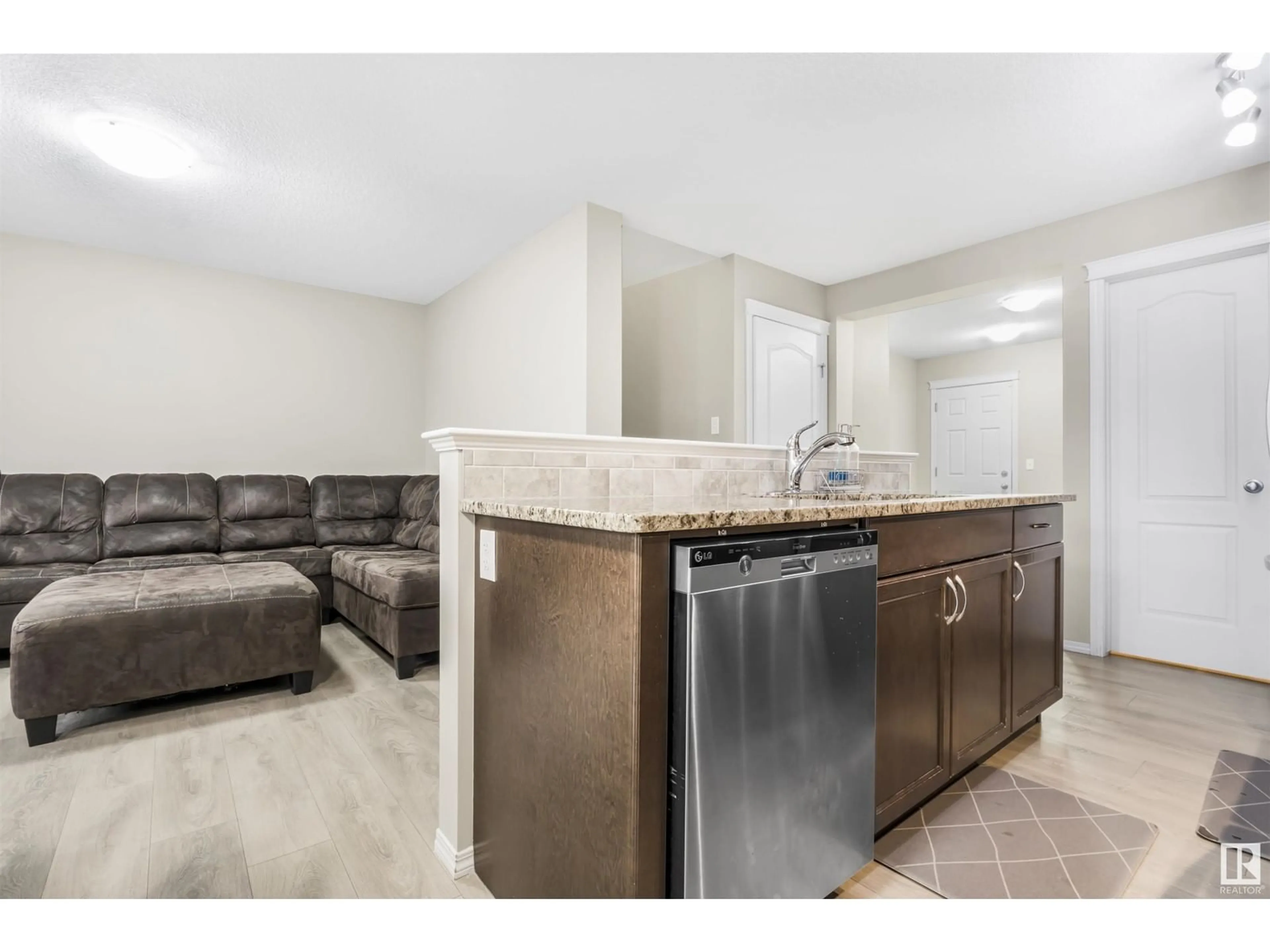 Open concept kitchen for 1512 27 AV NW, Edmonton Alberta T6T0W2