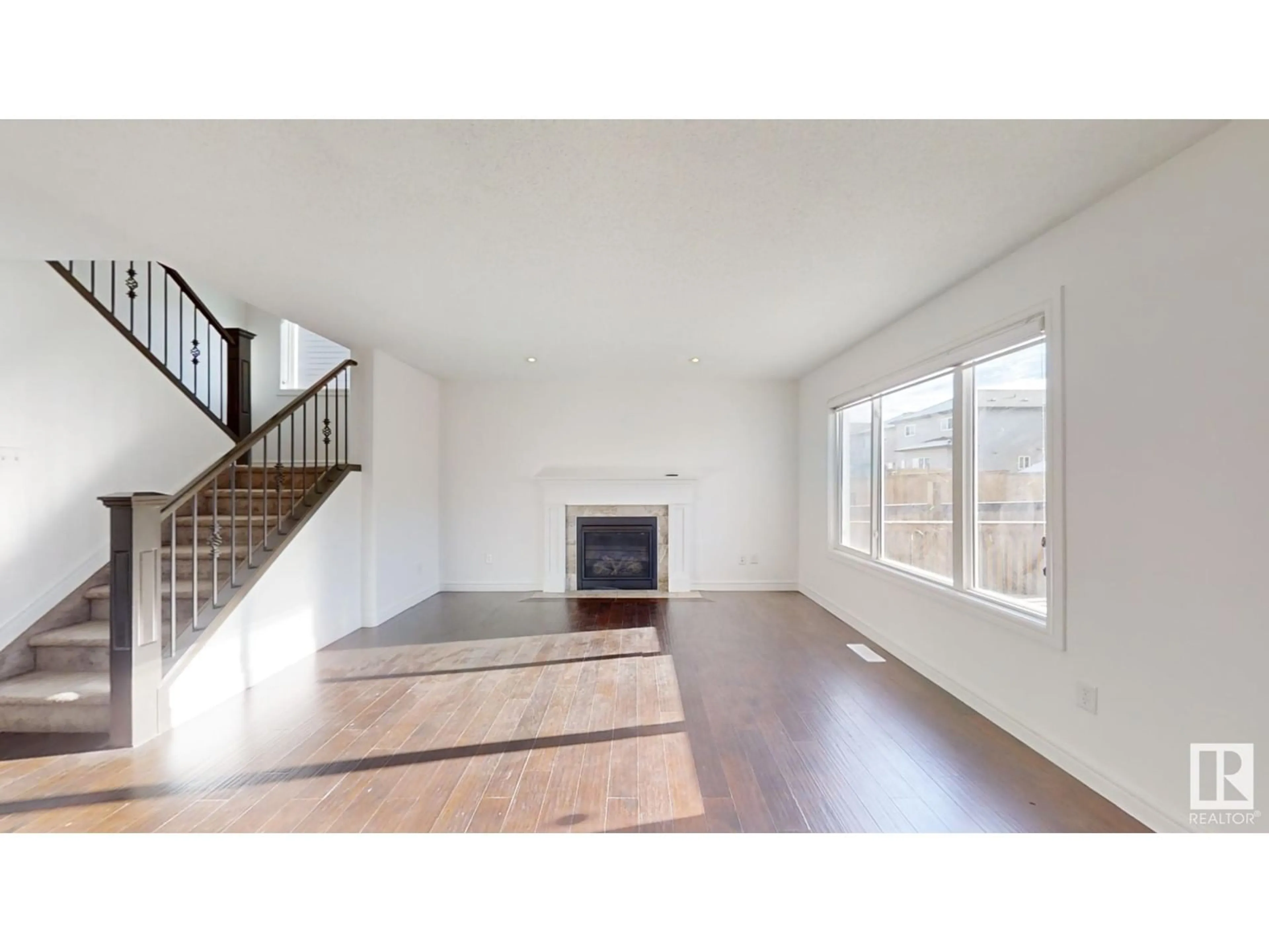 A pic of a room, wood floors for 3207 13 AV NW, Edmonton Alberta T6T0Z3