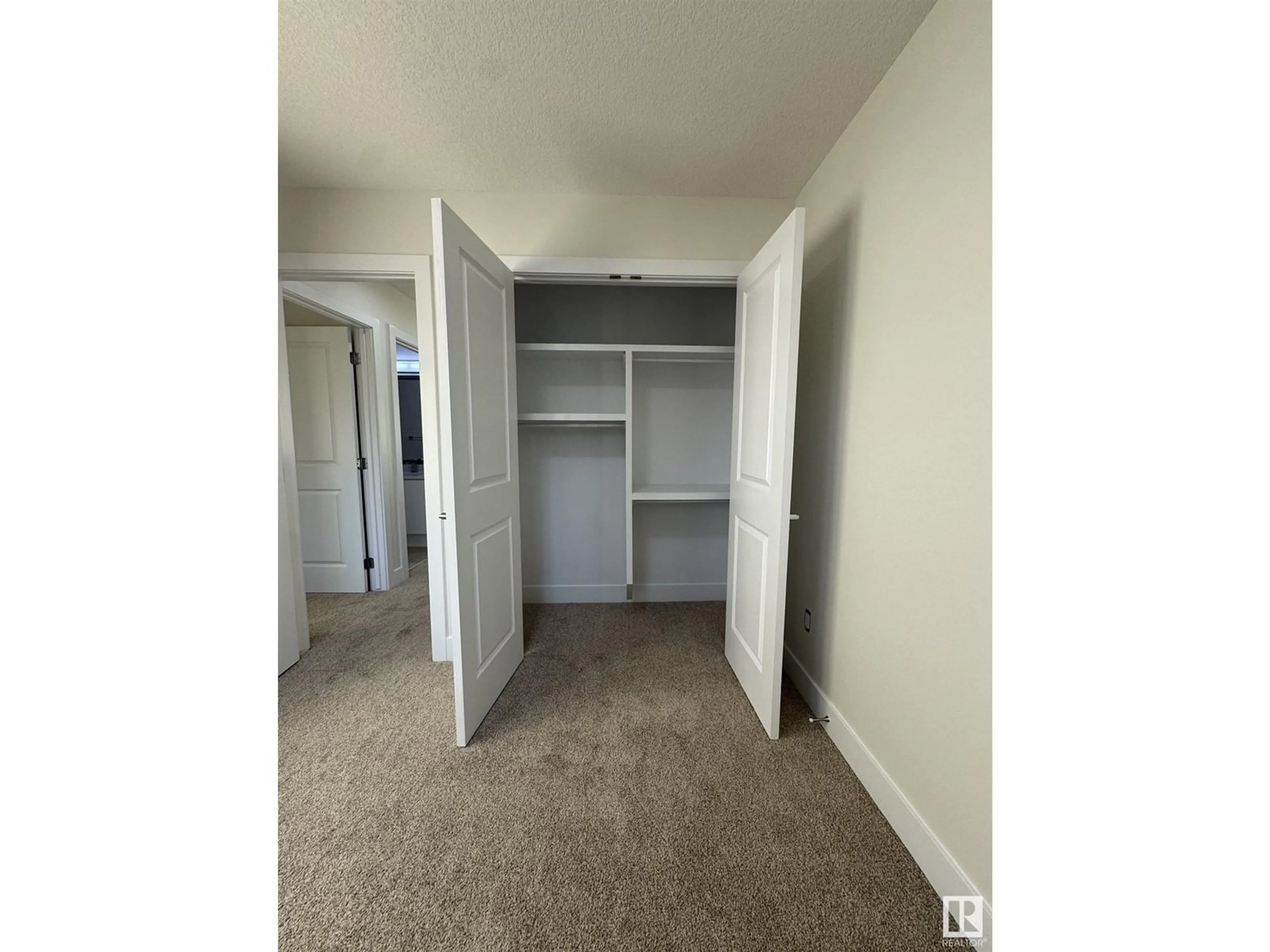 Storage room or clothes room or walk-in closet for 9330 89 ST NW, Edmonton Alberta T6C3L2